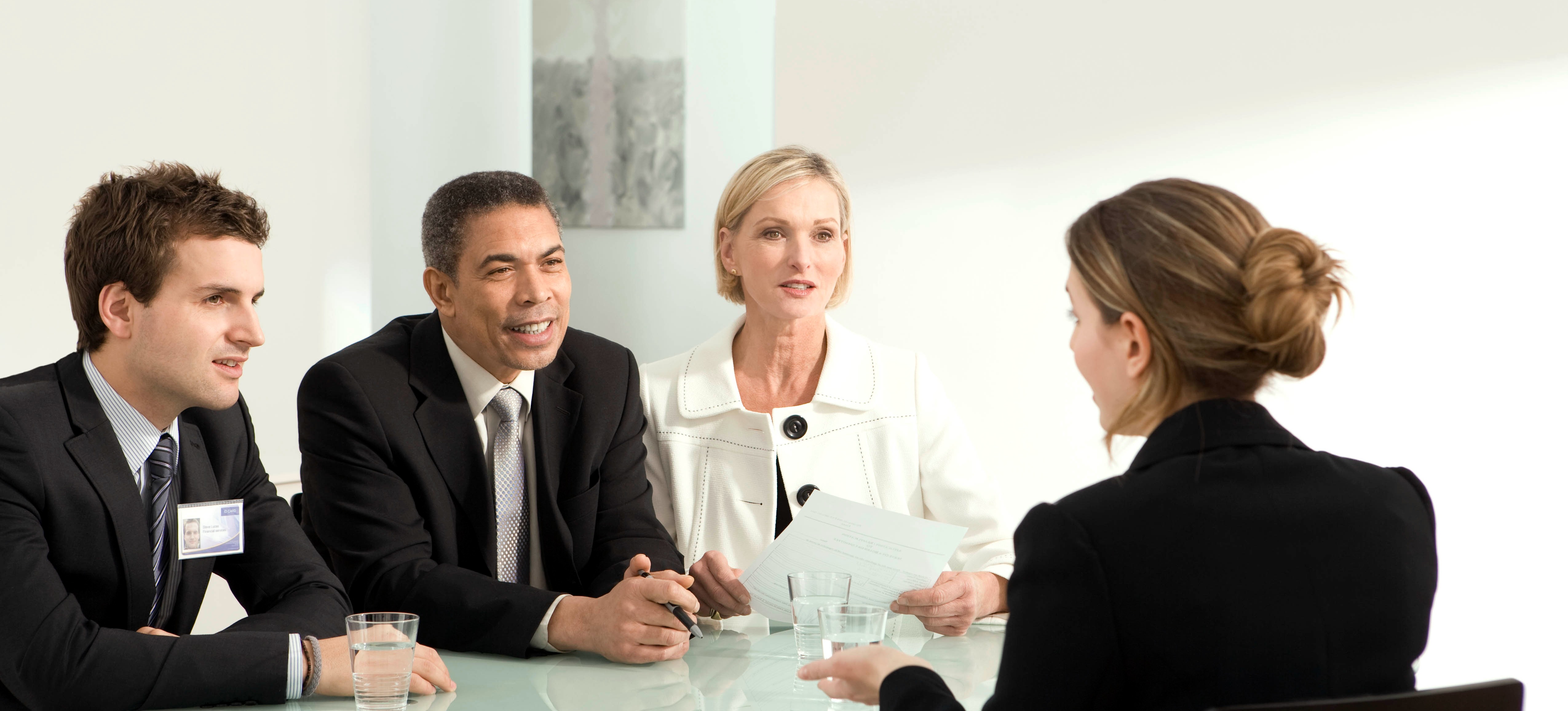 [Featured Image] An ethical hacker attends a job interview because they want to get a job in cyber security in the telecom industry.  
