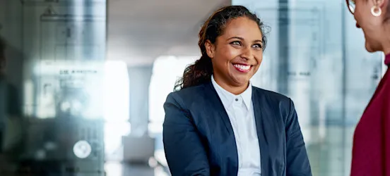 [Featured image] A barrister meets with a client after receiving their LLB.