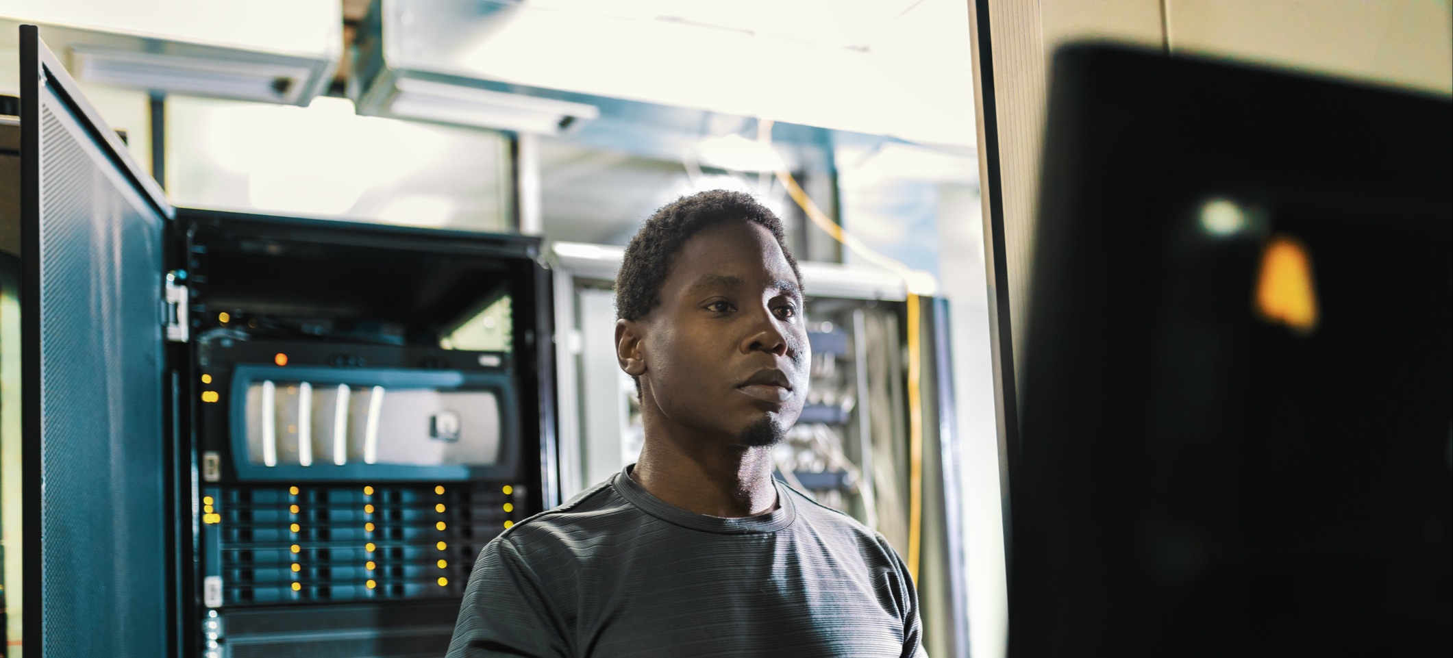 [Featured Image]  An IT professional browses DBA certifications on a desktop computer.