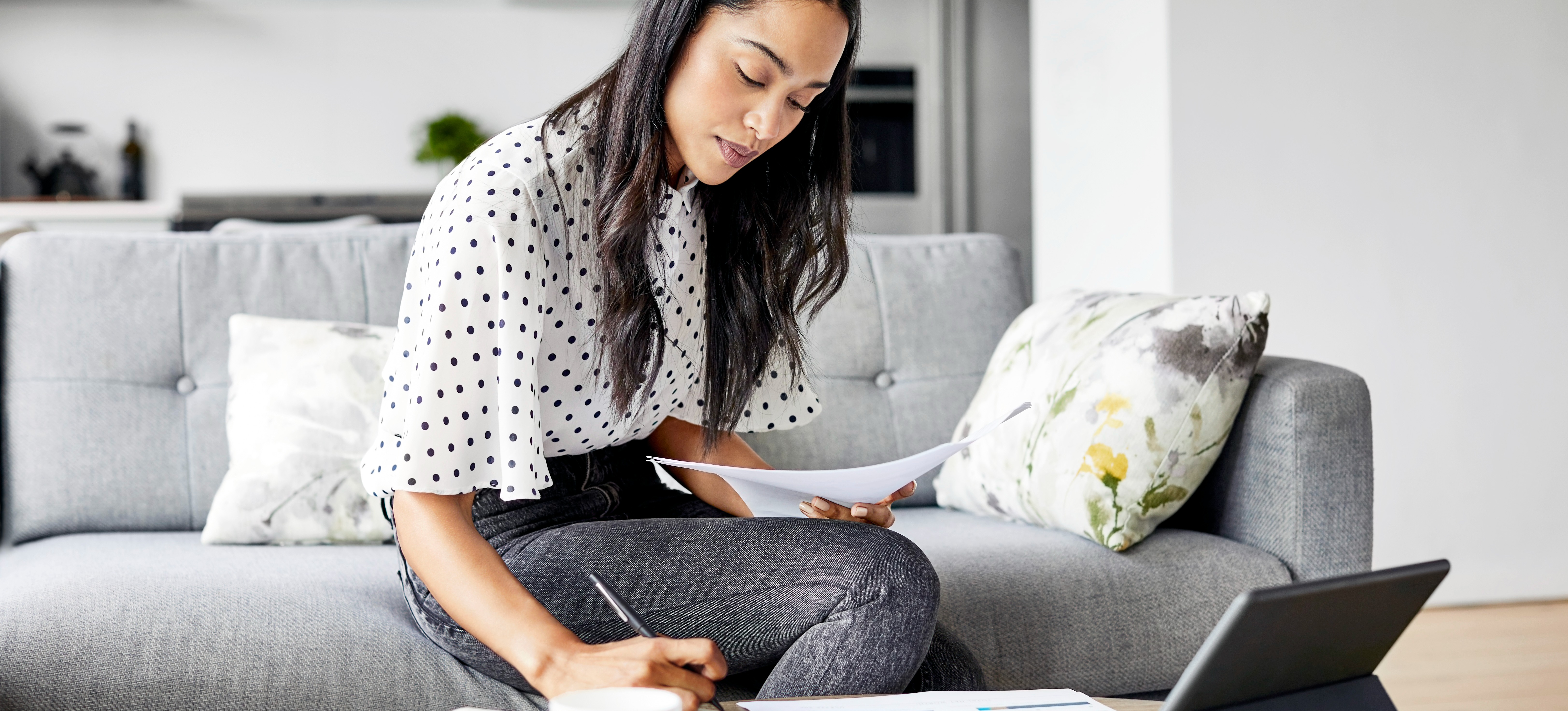 [Featured Image] A business analyst studies in preparation for taking their Power BI certification exam.
