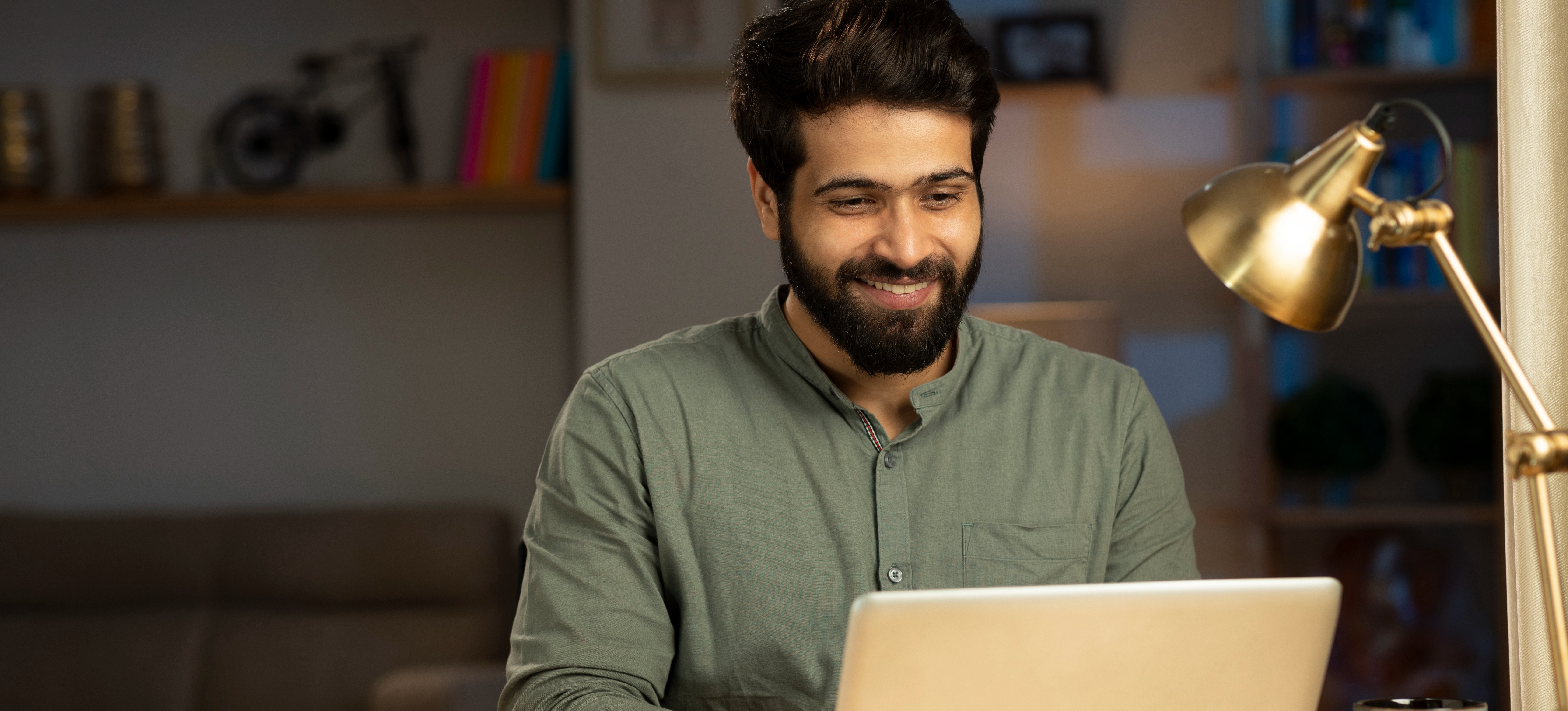 [Featured Image]: A full-stack engineer uses a laptop to test a program they wrote before releasing it to other users.
