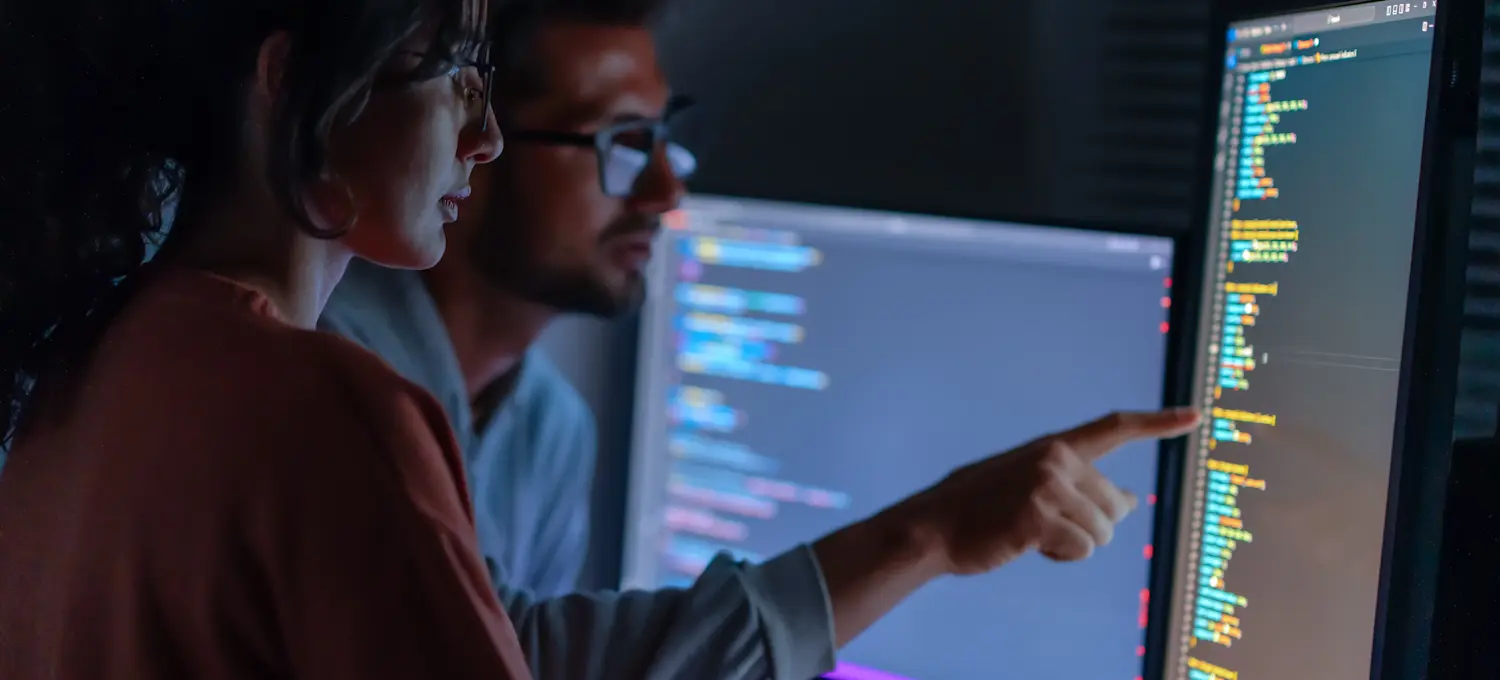 [Featured image] An MLOps engineer works to develop a machine learning model. 
