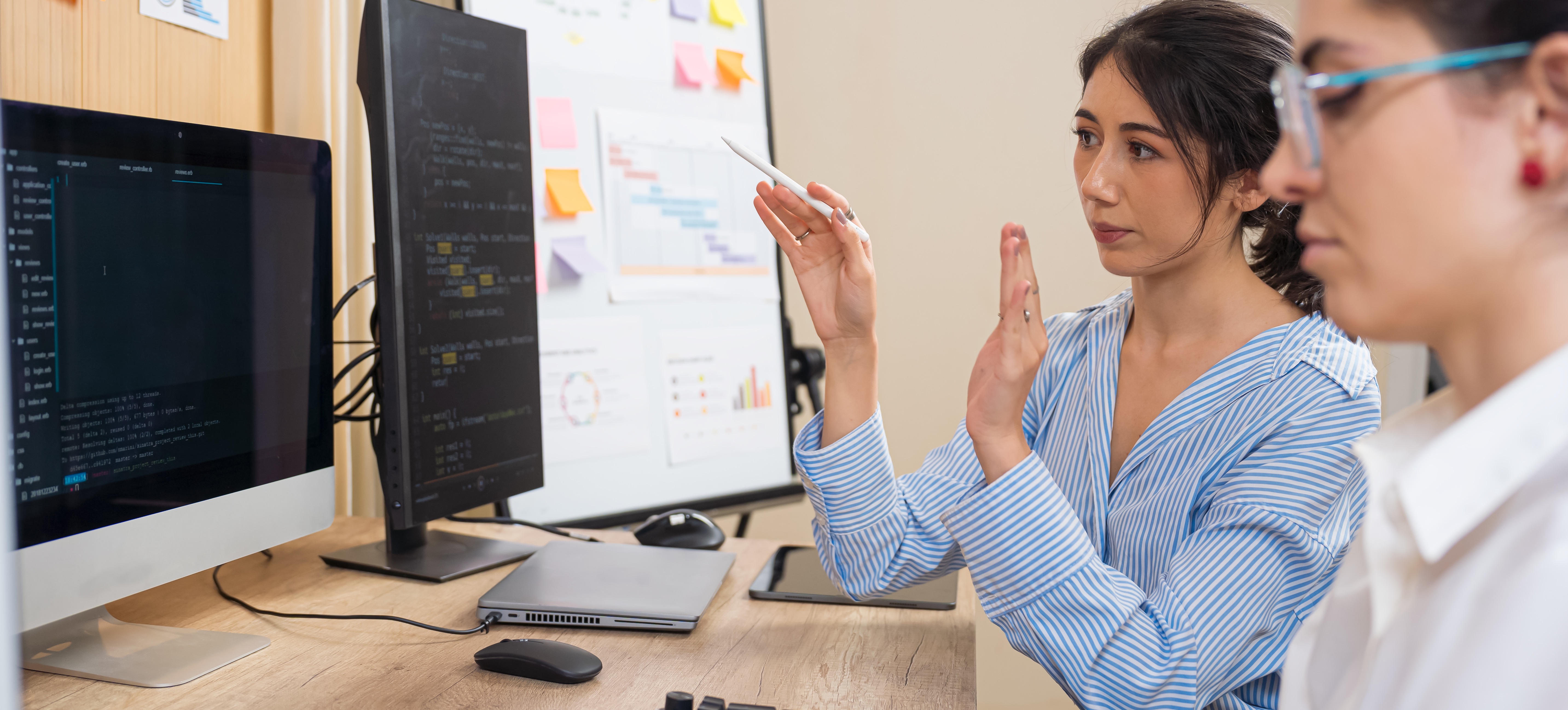 [Feature Image]: A learner sits with their instructor, learning about Web3 and jobs they might pursue, including a position as a Web3 developer.
