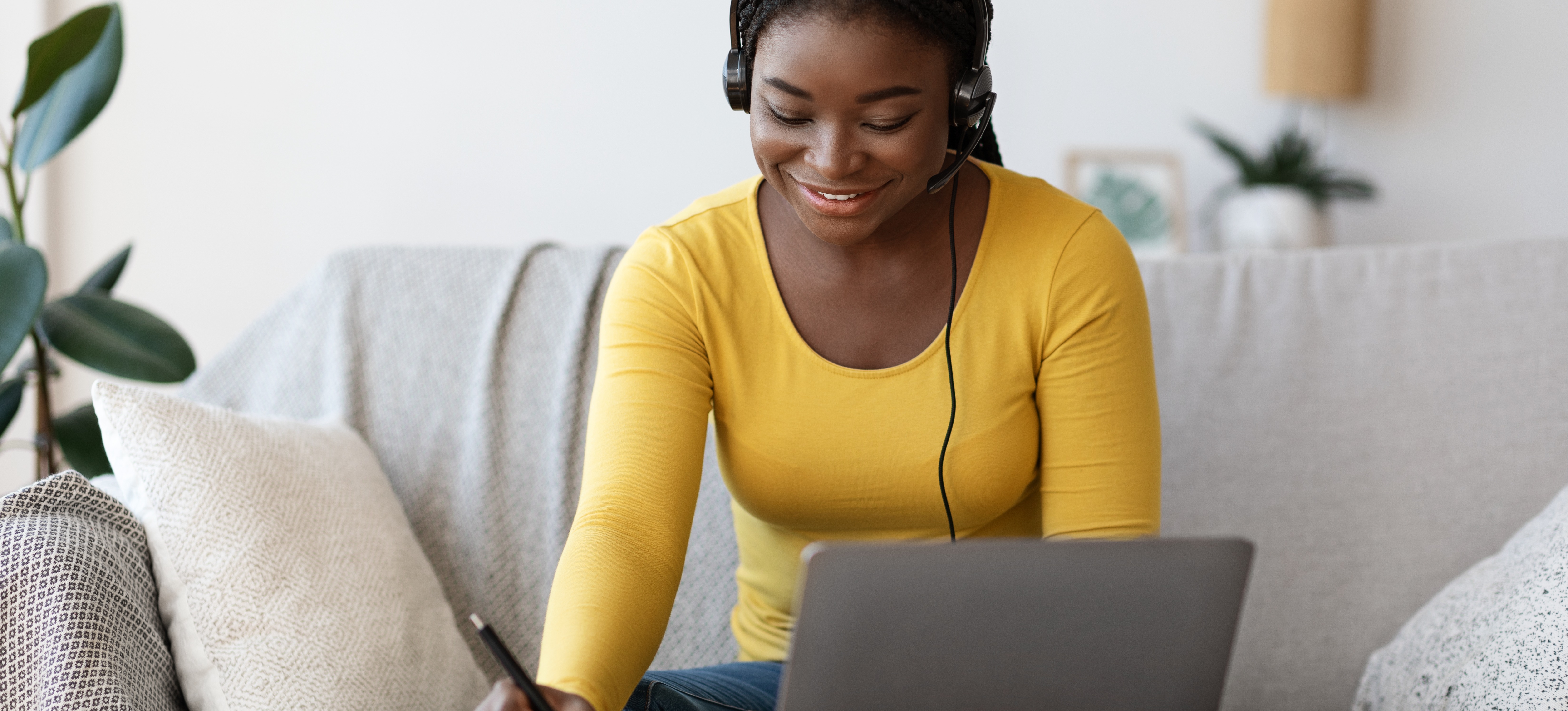 [Feature Image] An aspiring data analyst researches “What can I do with a master’s in data analytics” on their laptop computer. 