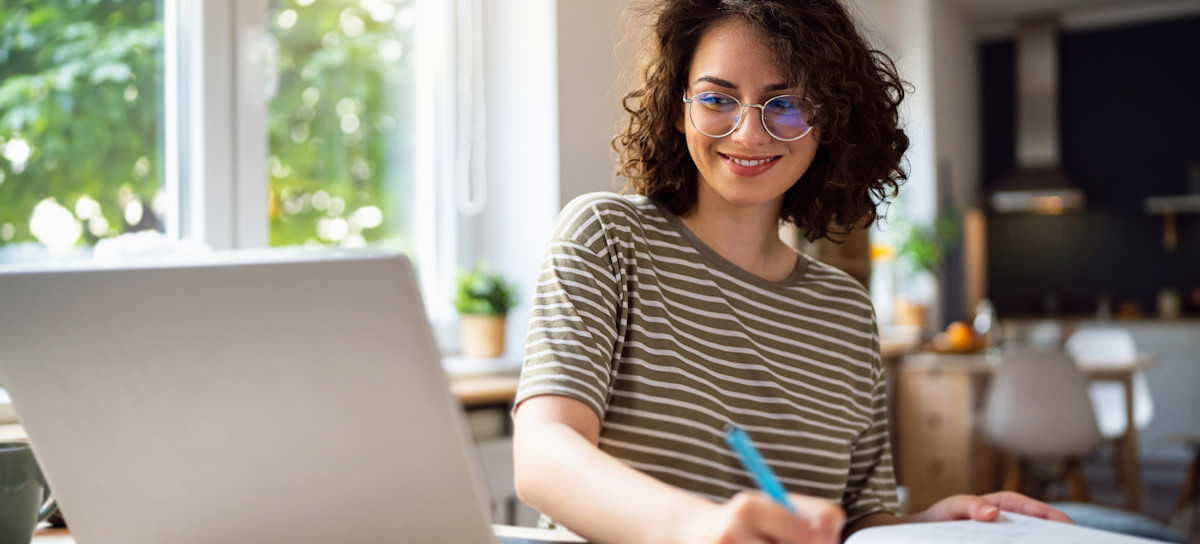 [Featured Image] An IT professional reviews content to prepare for a network certification exam. 
