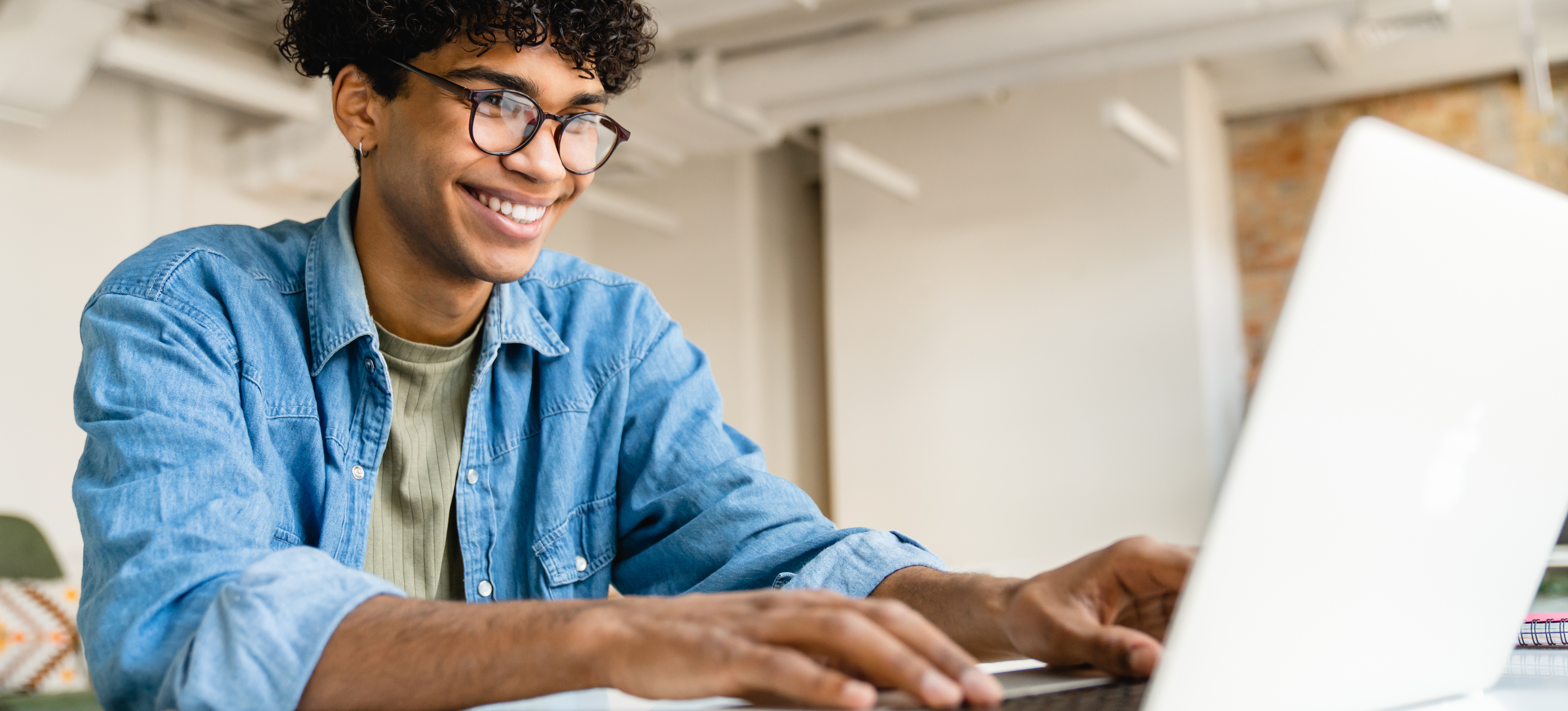[Featured Image] An office employee learns how to password protect Google Sheets on their laptop. 