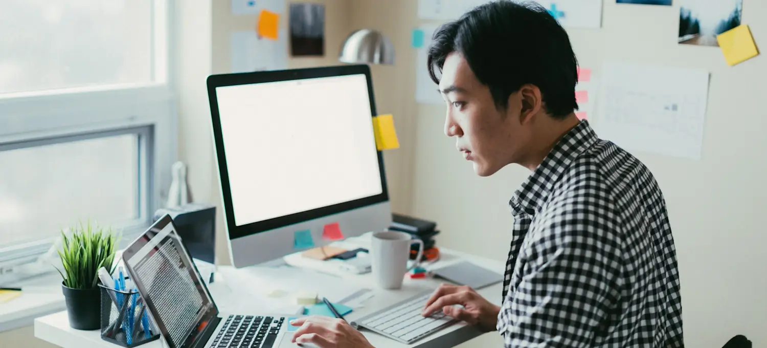[Featured image] A UX writer is reading about microcopy. 