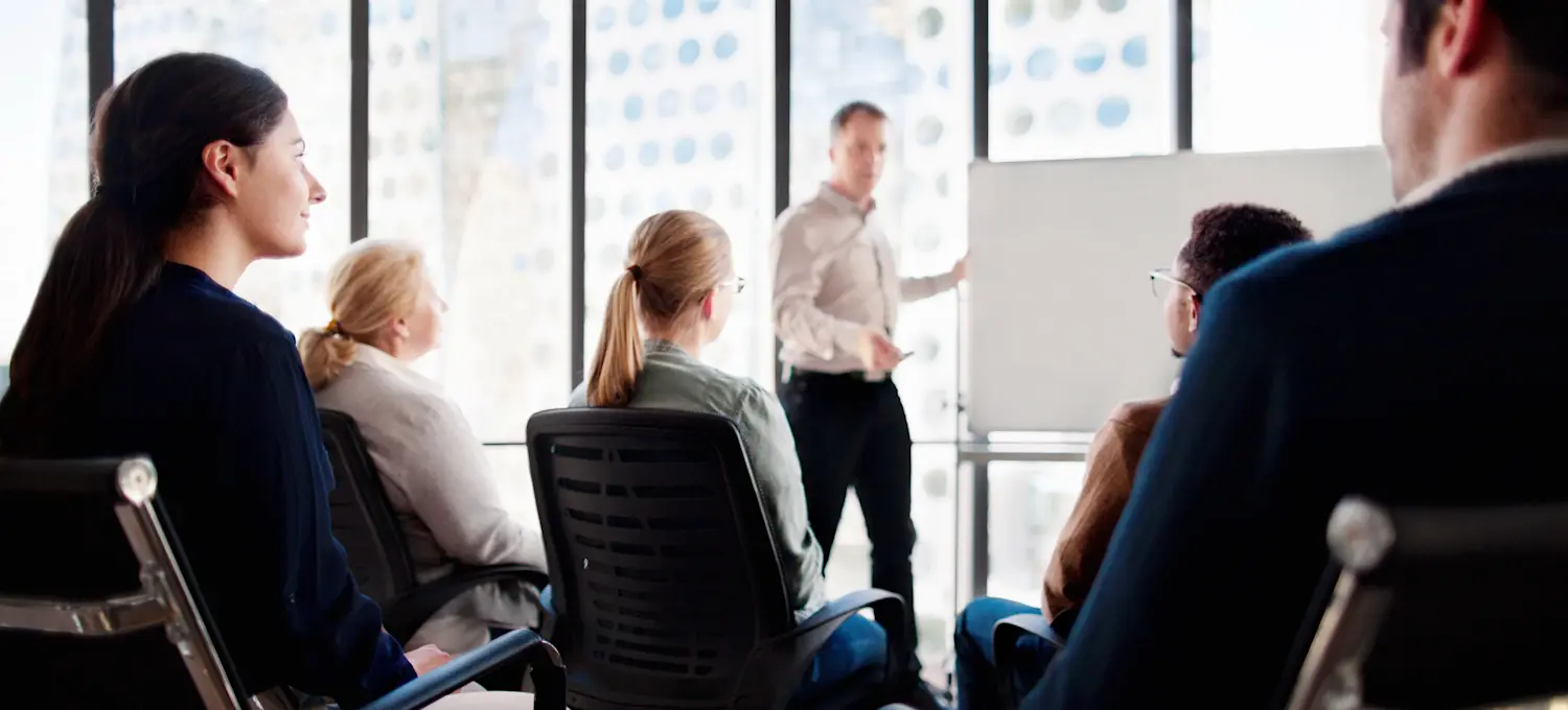 [Featured Image] A group management training session to become better leaders is in progress.
