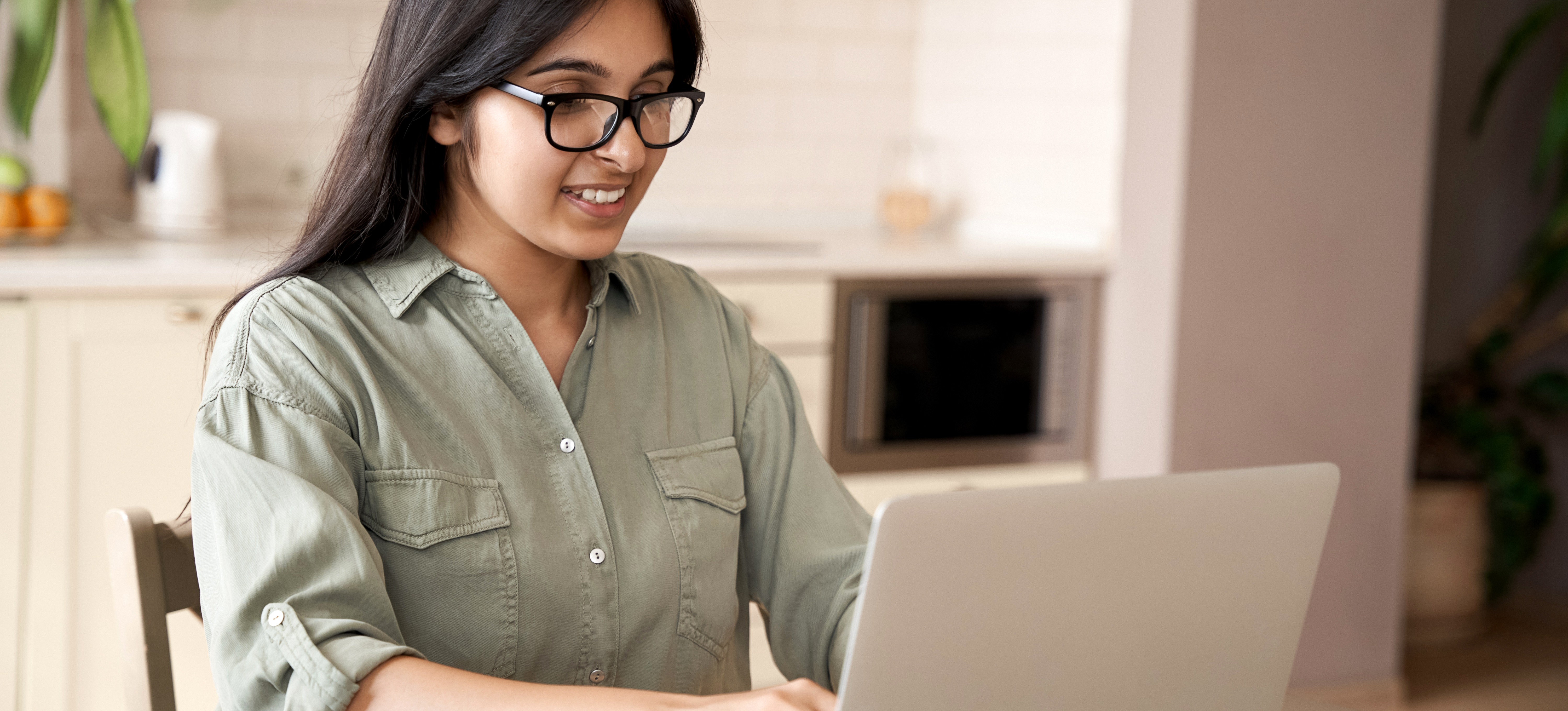 [Featured Image]: A person types on a laptop computer as they prepare to take the CompTIA Security+ (Plus) certification exam.
