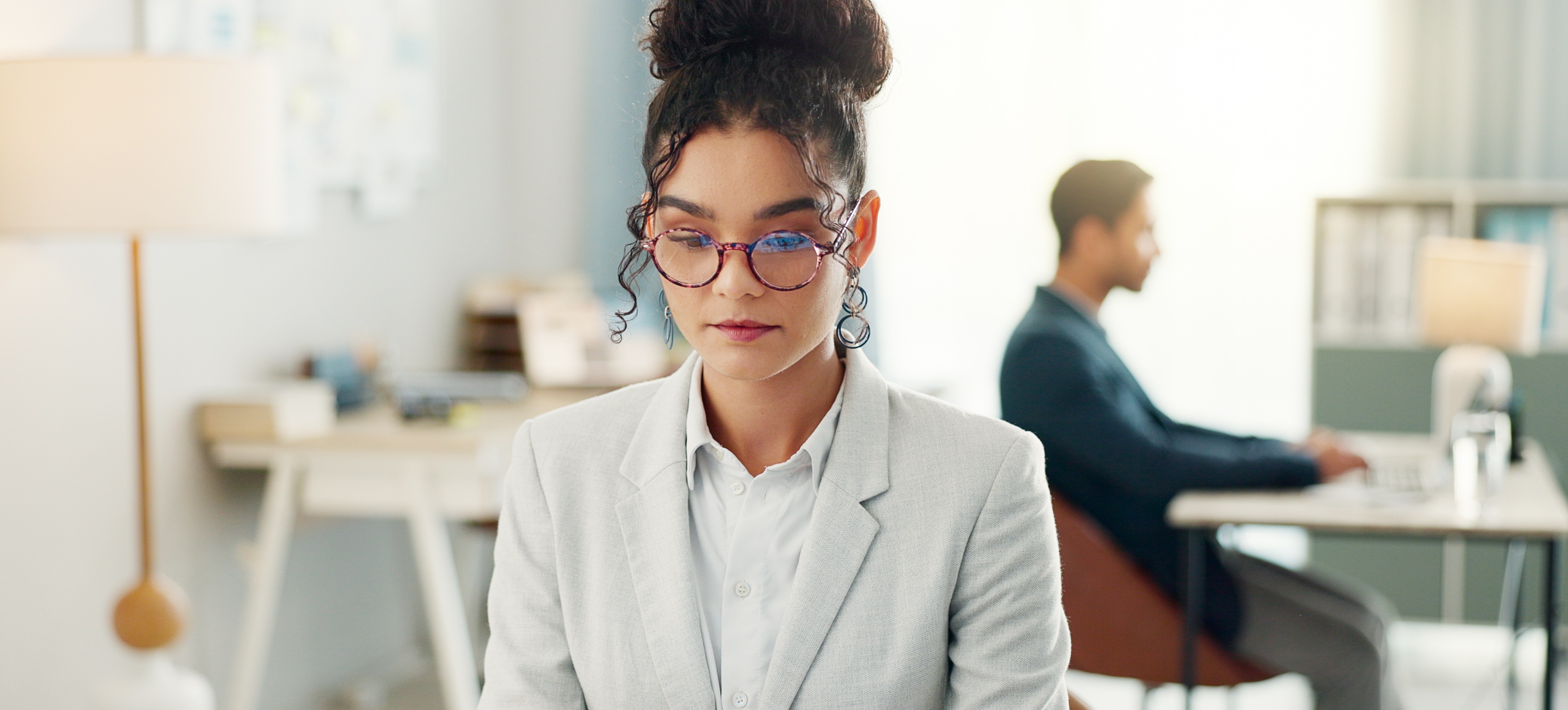 [Featured Image] After researching how to become a paralegal, a young learner built the necessary knowledge and skills and now works in a small legal office.
