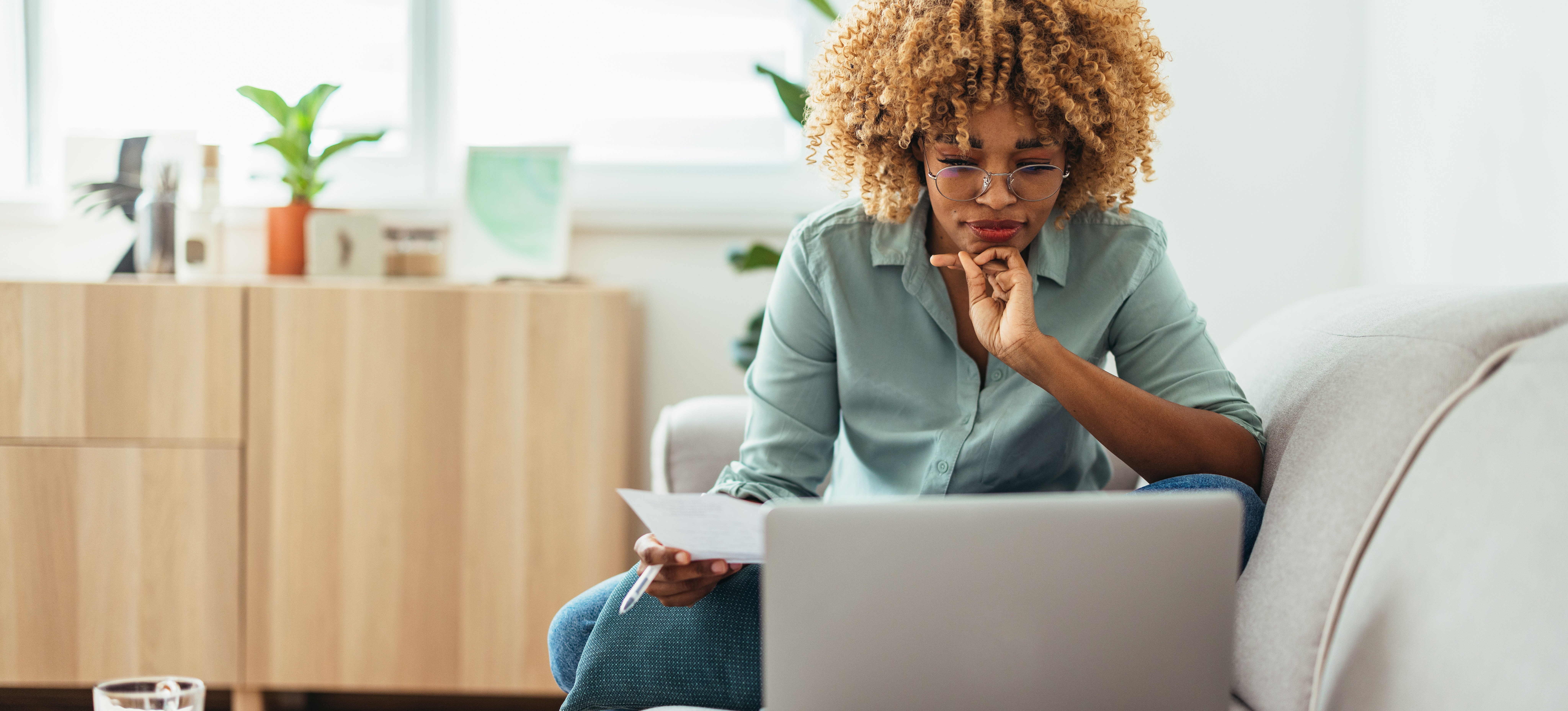 [Feature Image] A prospective learner researches the best business majors to align their degree program with their career goals. 
