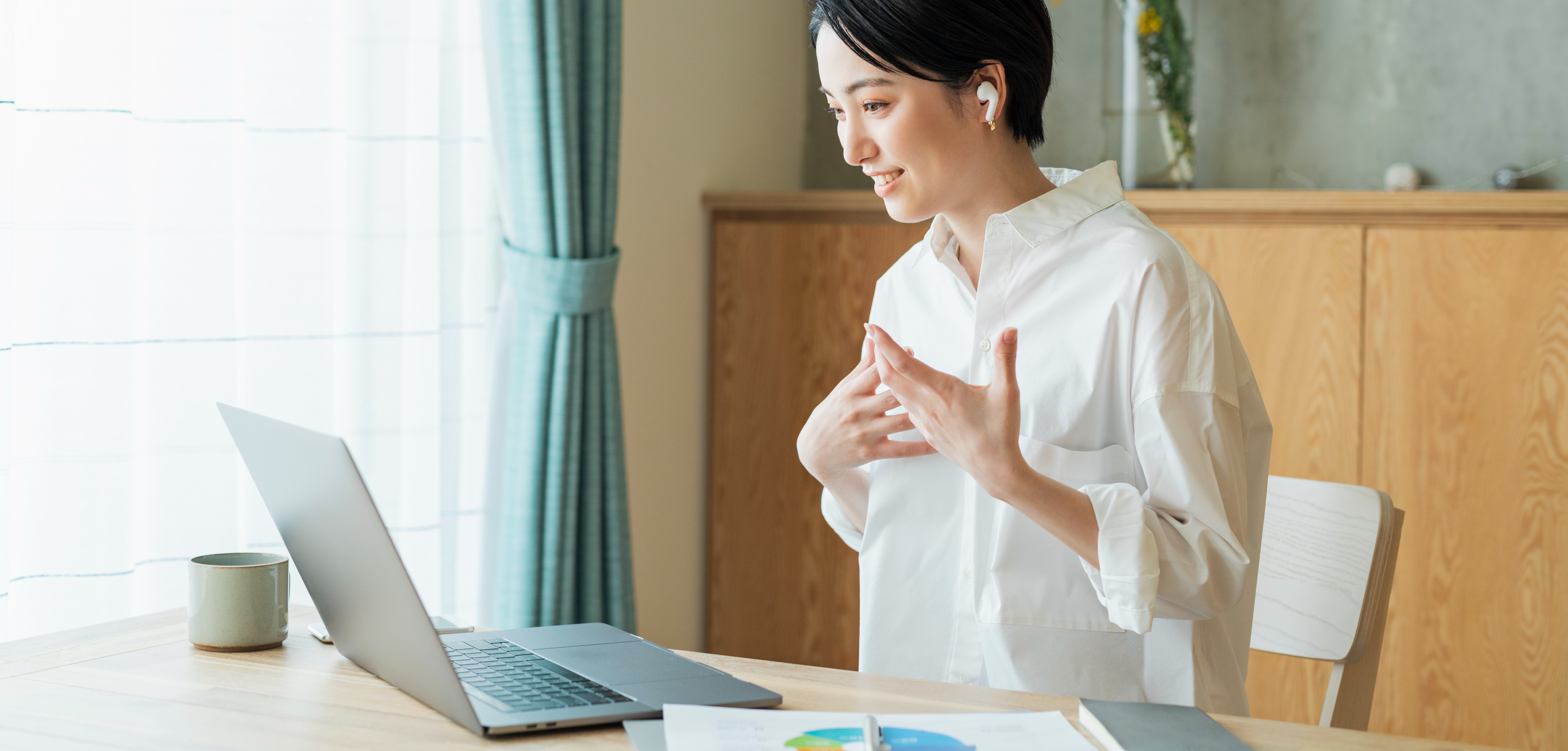 [Featured image]: A person talks via video call with their supervisor to resign from a job.