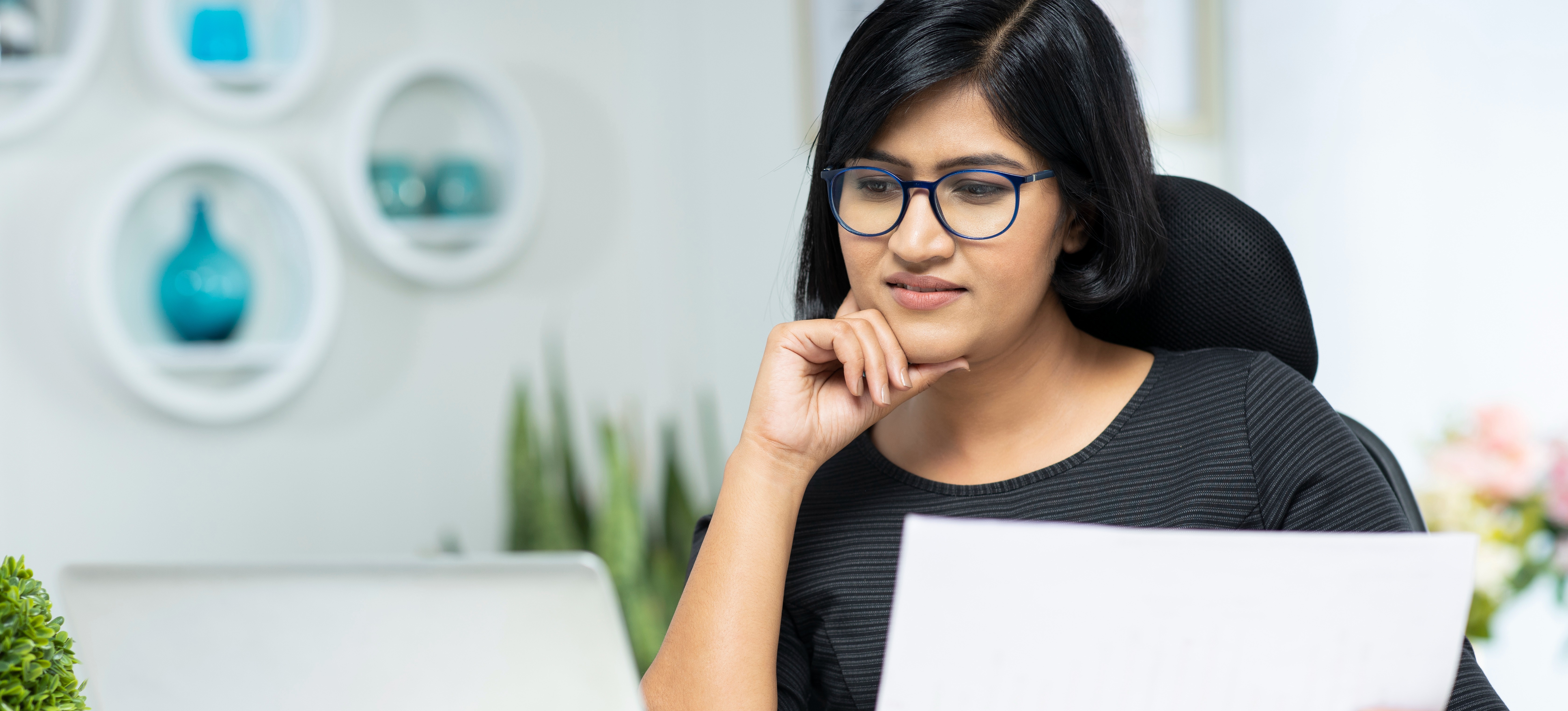 [Featured Image] A business leader researches the FAT32 file system as they brush up on their IT options and requirements. 
