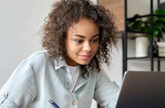 [Featured image] A computer science intern is studying using their laptop computer.