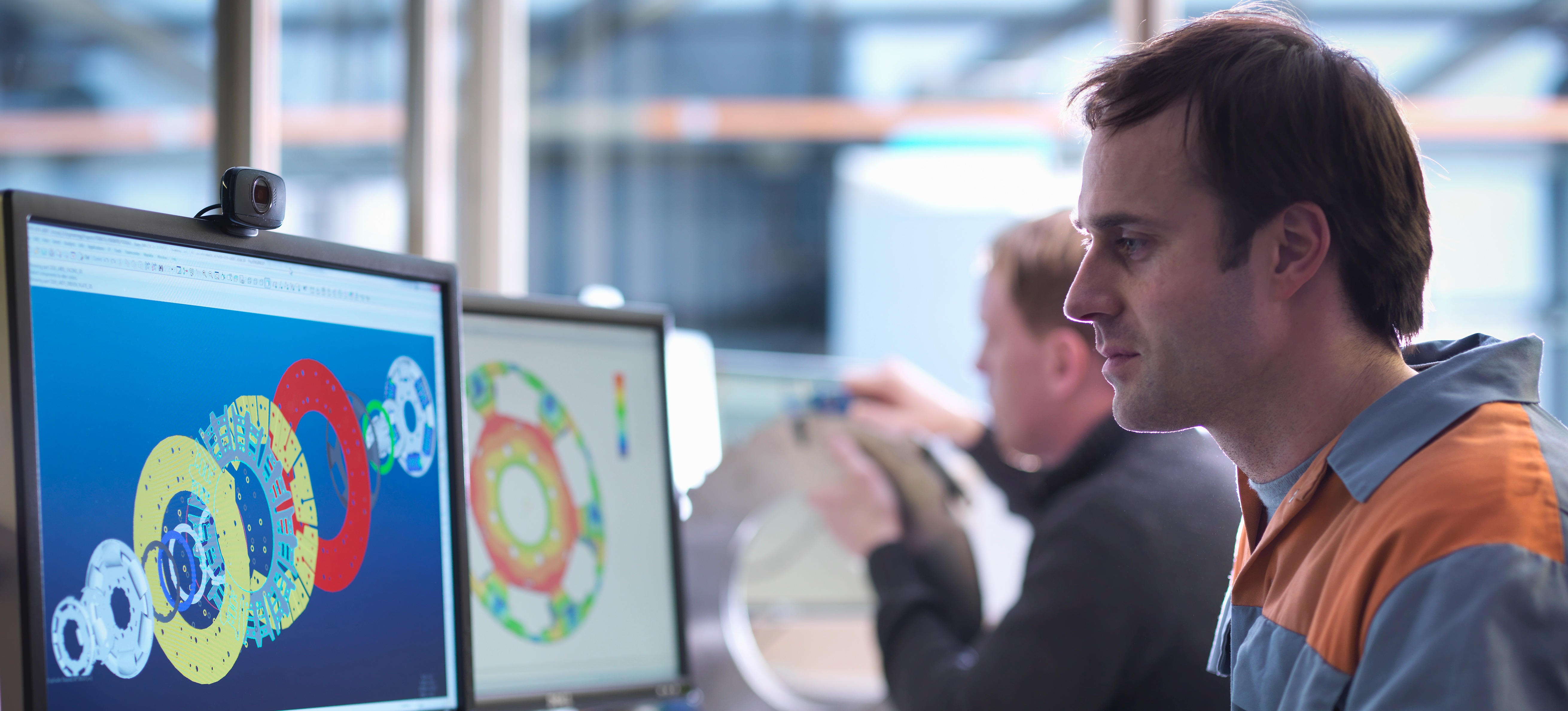 [Featured Image] A computer vision engineer working in a professional environment, using a specialized platform to develop AI-driven image recognition solutions.
