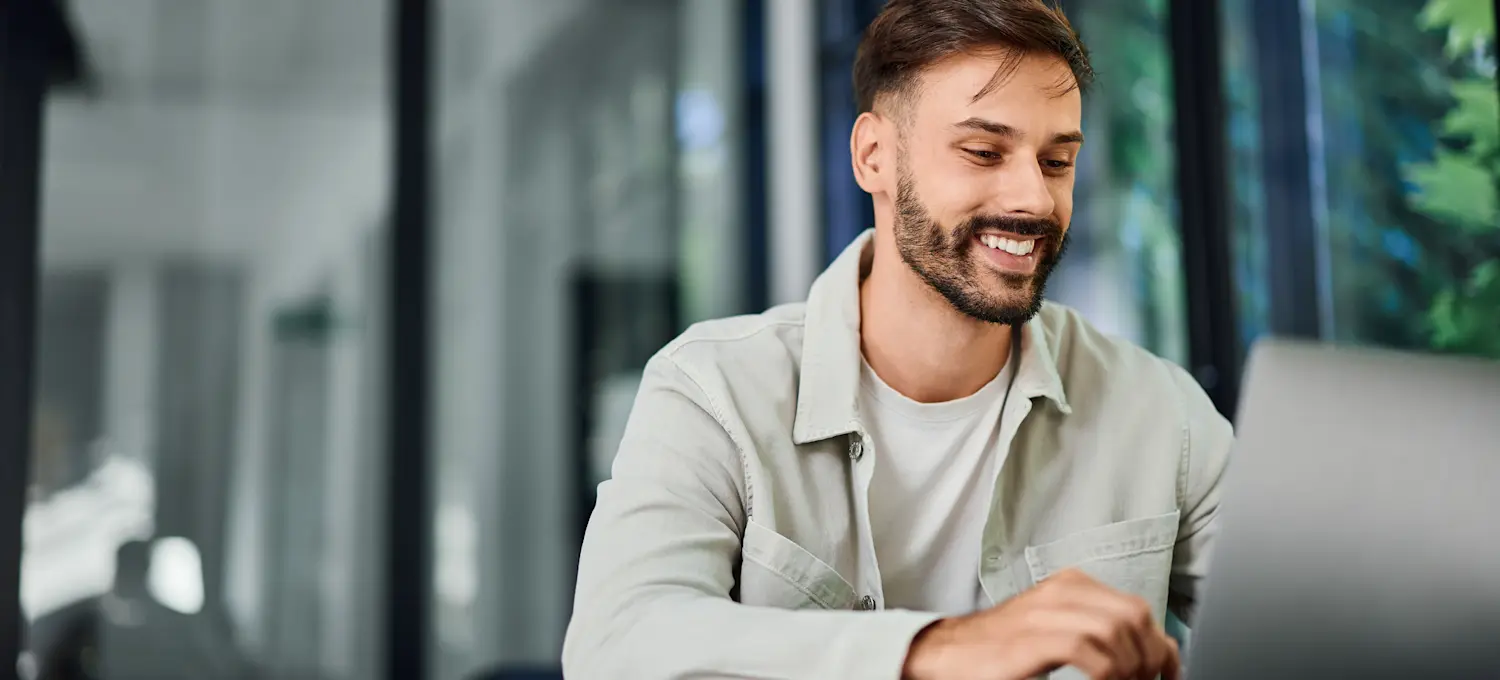 [Feature Image] An aspiring computer vision professional researches semantic segmentation versus instance segmentation on a laptop to learn more about the two algorithms’ uses.
