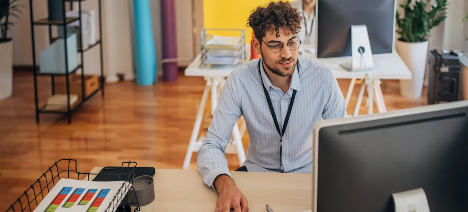 [Featured image] A product manager uses a painted door test to validate designs in an office.