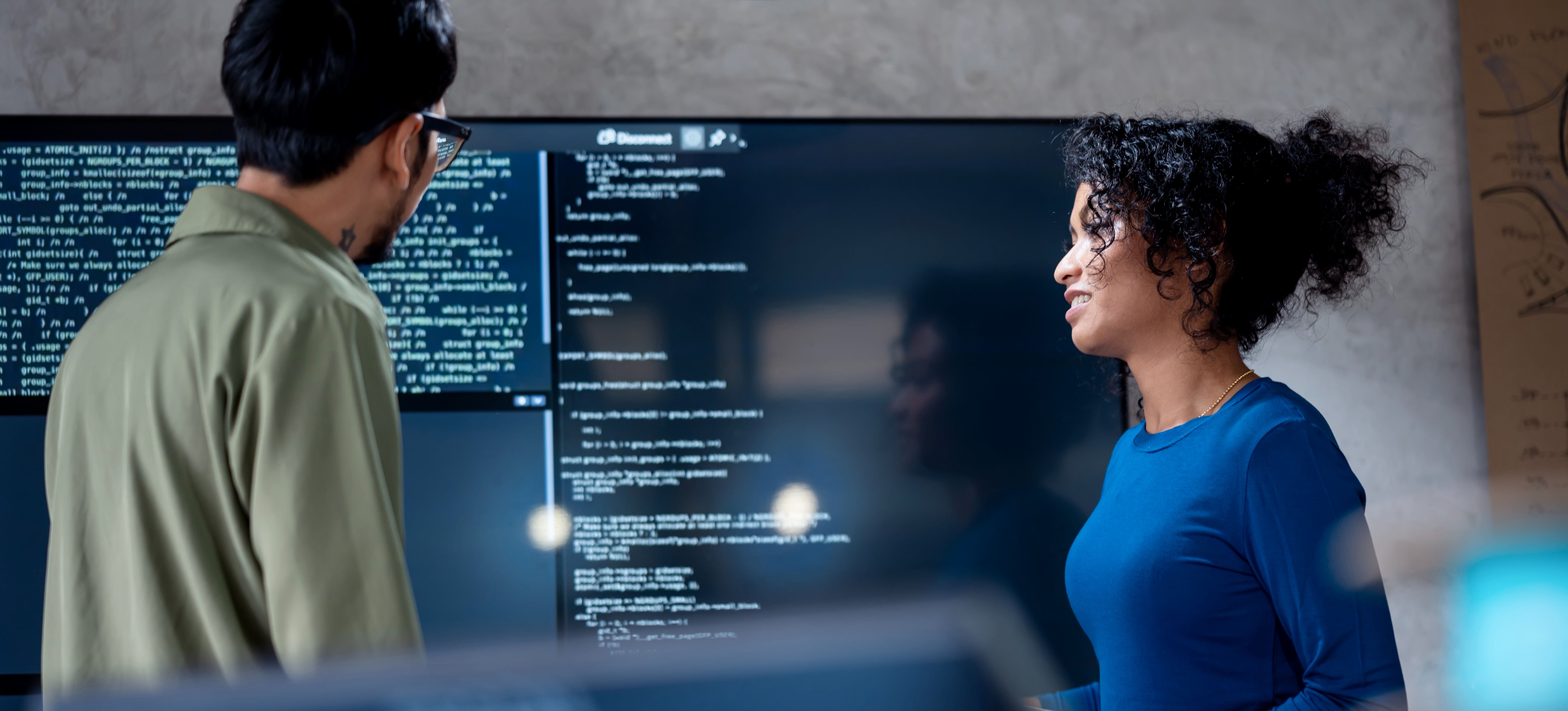 [Featured Image] Two cybersecurity professionals discuss the implementation of AI in their work.
