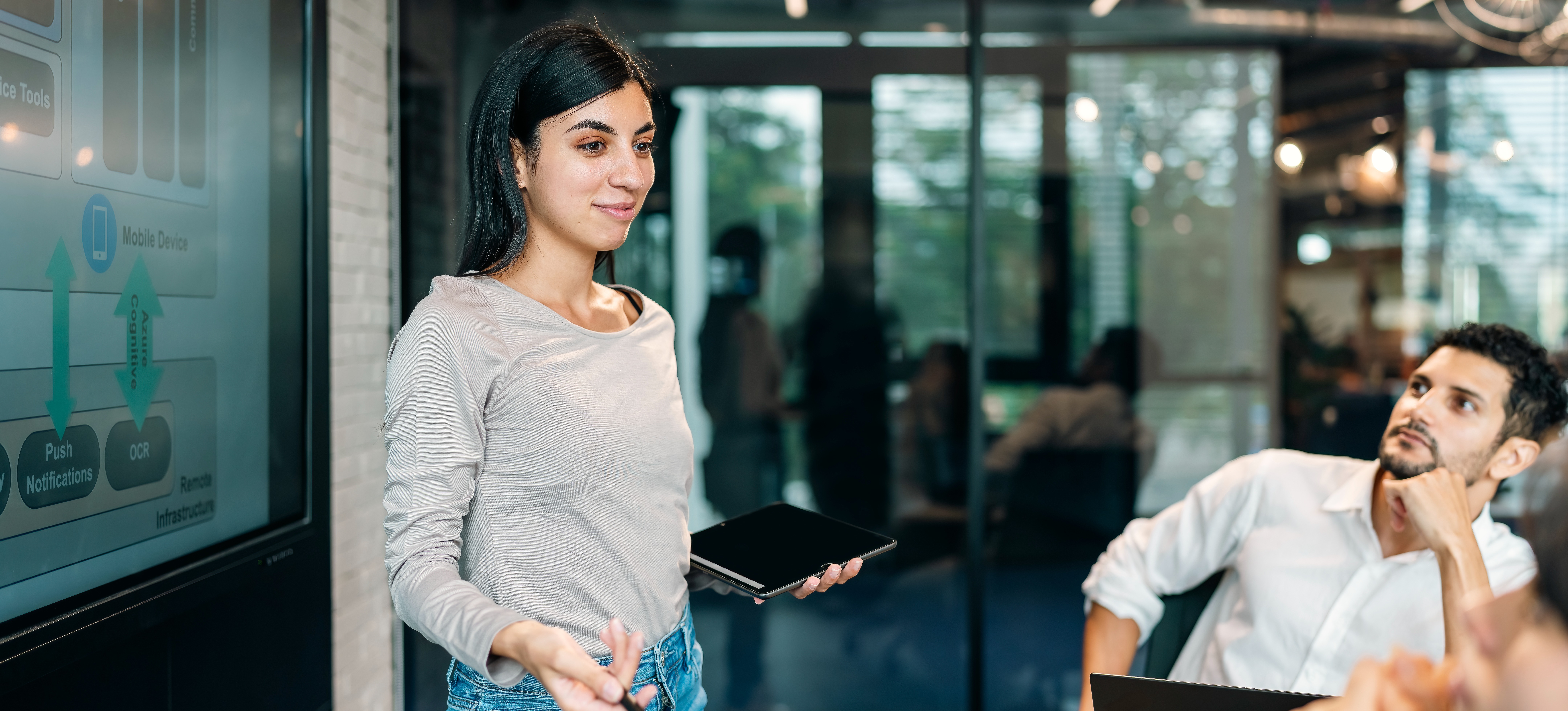 [Featured image]: A team member uses visuals, including a fishbone diagram, to help identify the cause of a problem slowing down a project.
