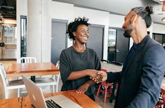 [Featured Image] Woman starts a job in an IT role at a new company