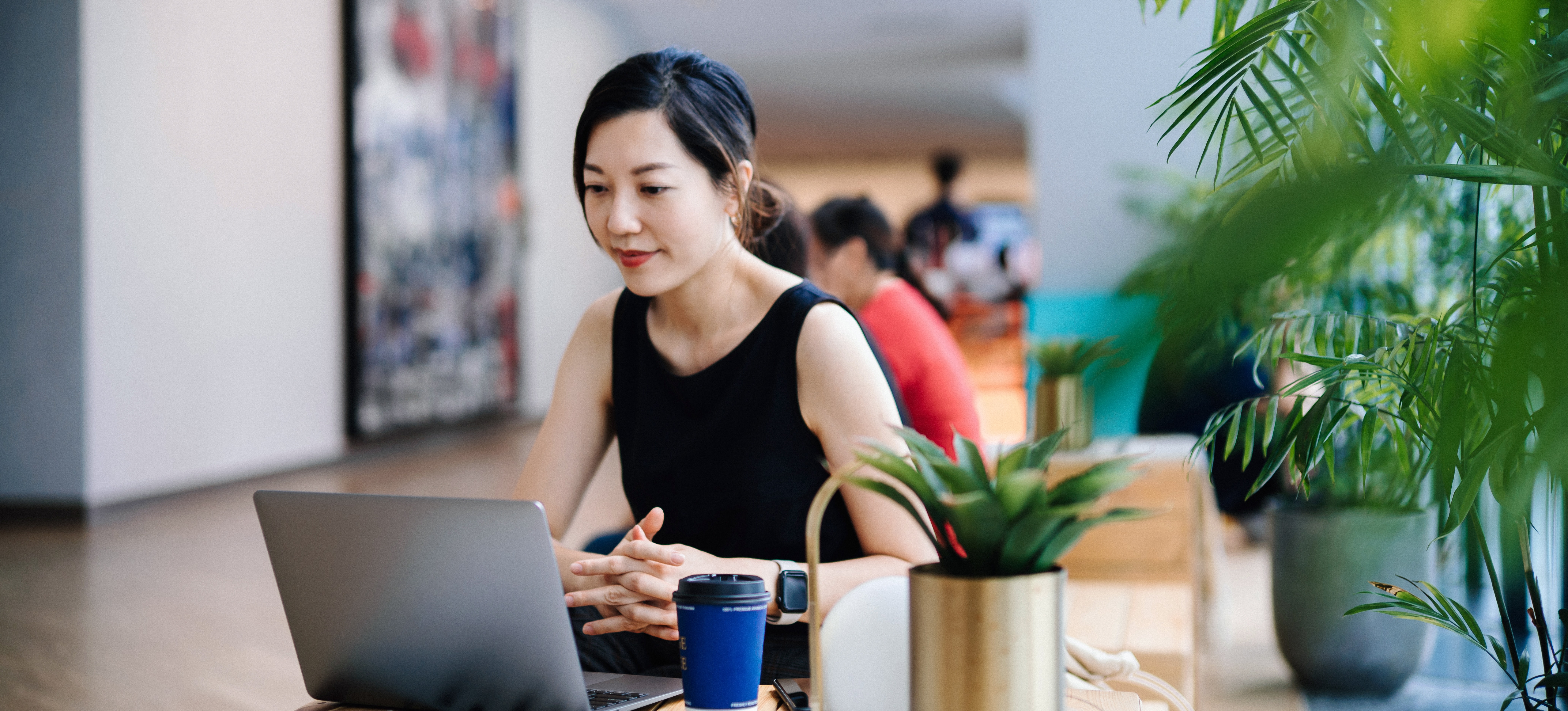 [Featured Image] An aspiring AI professional sits at a laptop in a library and takes a course from the NVIDIA Deep Learning Institute.
