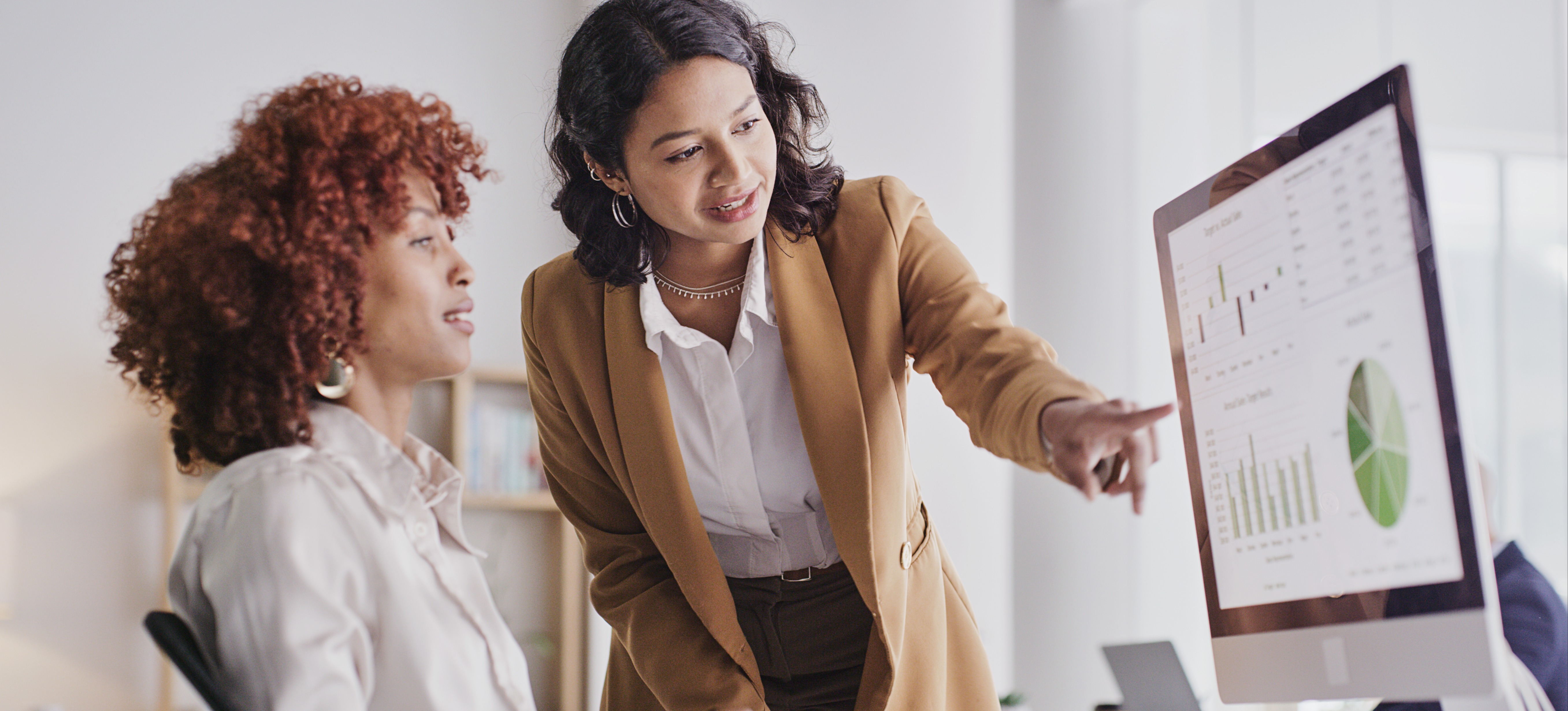 [Featured Image] Two data scientists use PySpark for data processing and analysis while working on a machine learning model.
