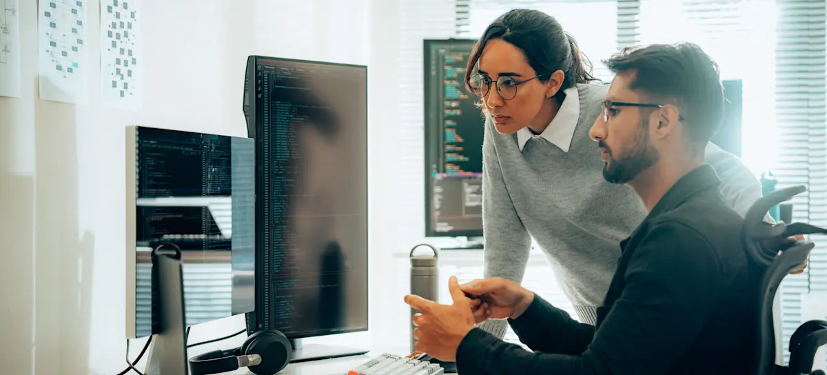 [Featured Image] Two cybersecurity analysts discuss vulnerabilities in their organization’s system and how to prevent hacking attempts.
