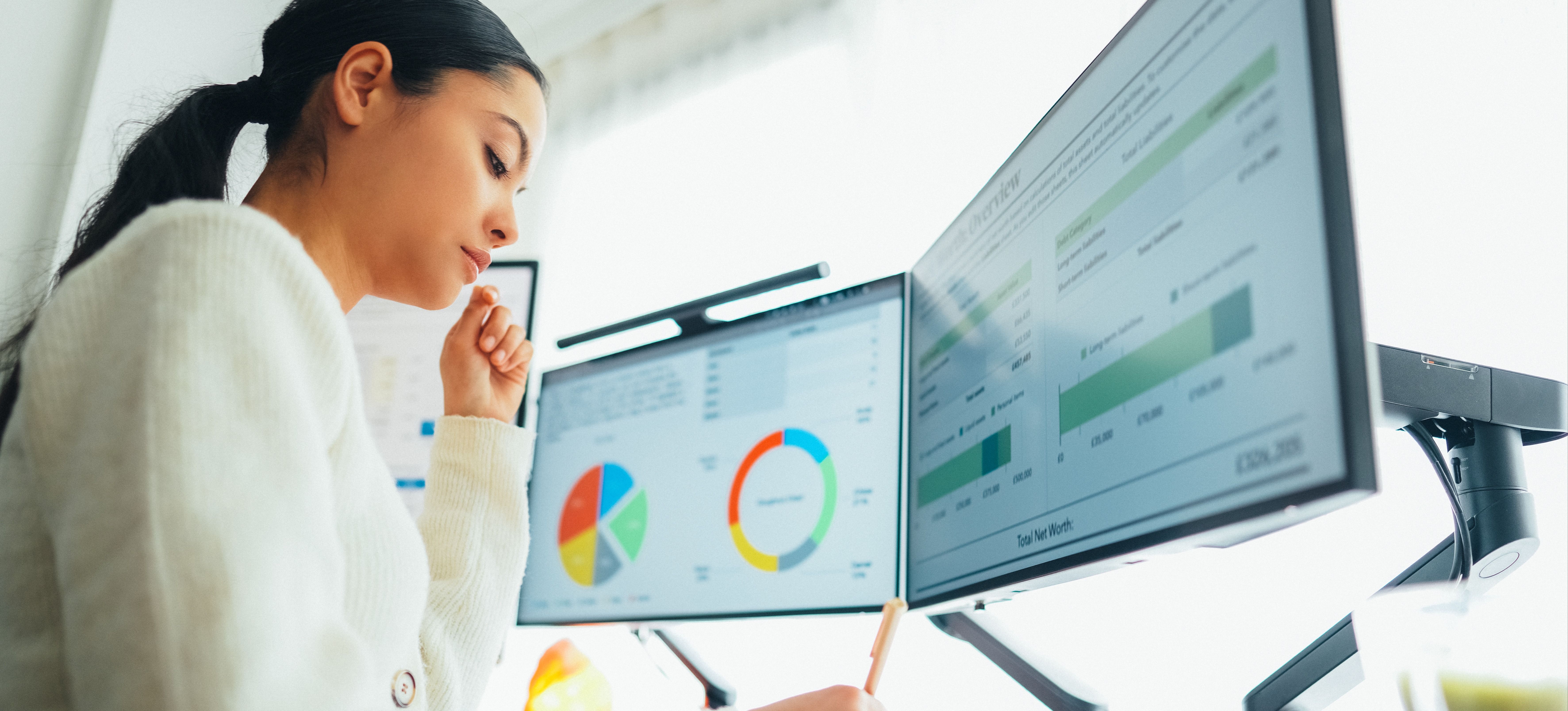 [Feature Image] A person performs their duties while working in a generative AI role for a company.
