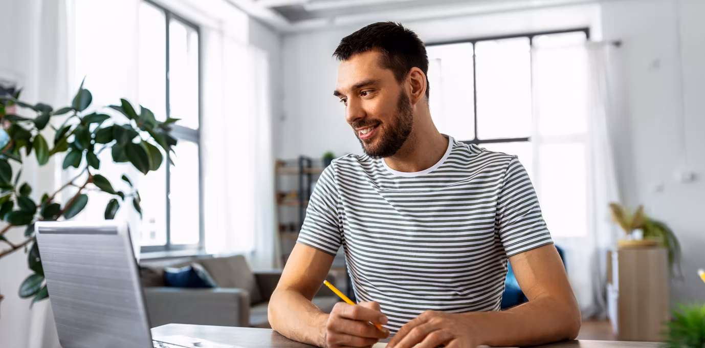 [Featured image] A person in a striped shirt writes a note asking for a letter of recommendation.