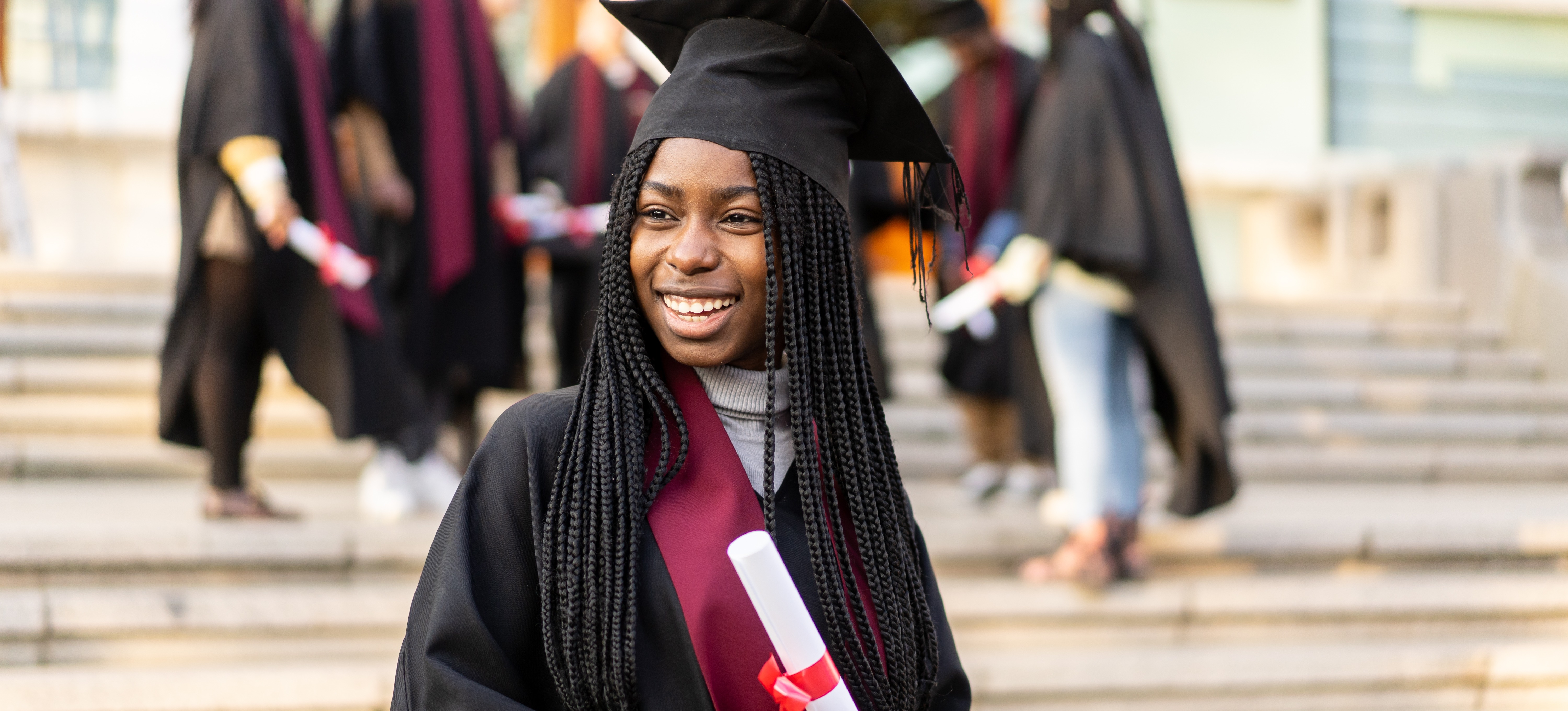 [Featured Image]: After consulting a guide to baccalaureate degrees and finding a programme that meets their goals, a group of undergraduates gathers for graduation.
