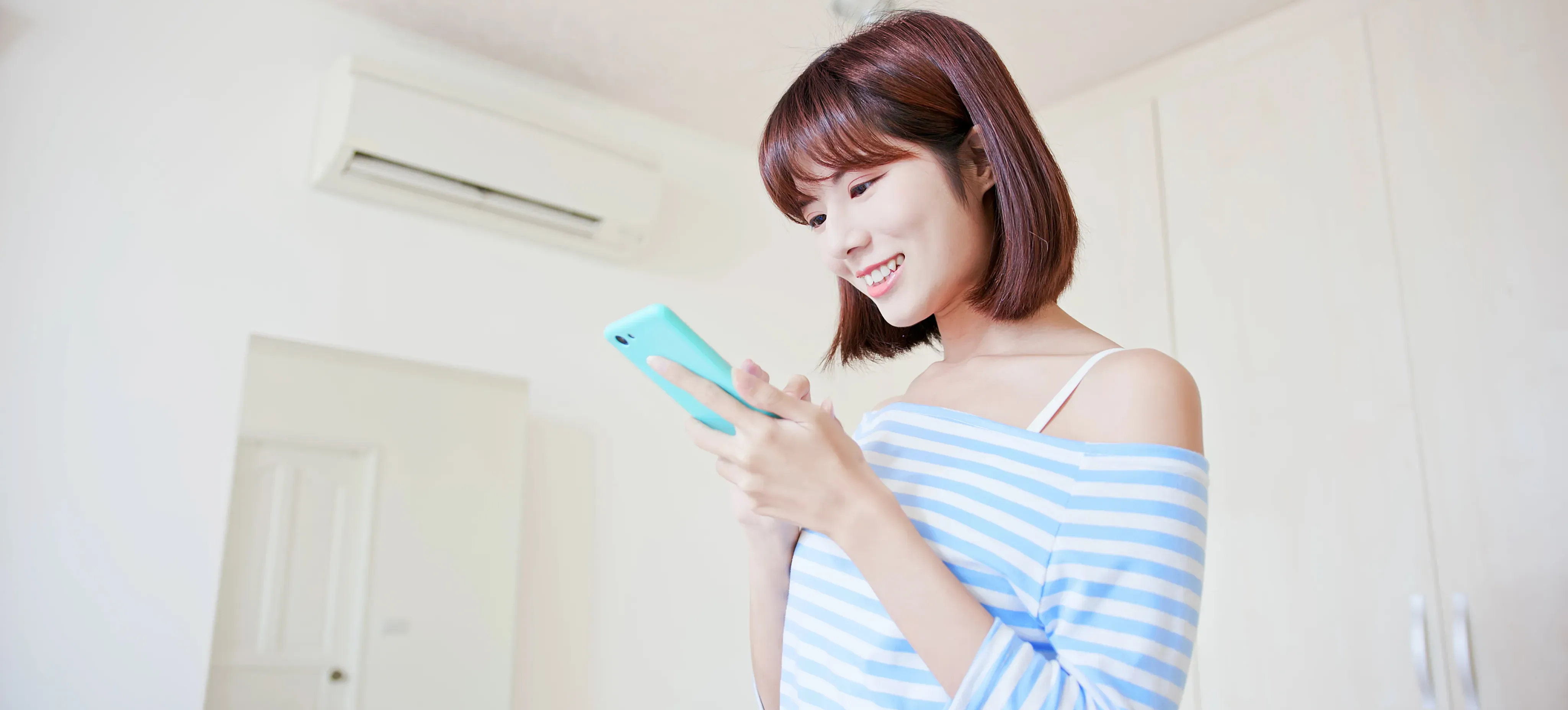 [Featured Image]: A person uses their phone to create content after learning that ChatGPT can help make videos.