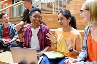 [Featured Image] Associate degree students gather to discuss classwork.