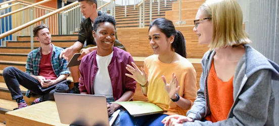 [Featured Image] Associate degree students gather to discuss classwork.
