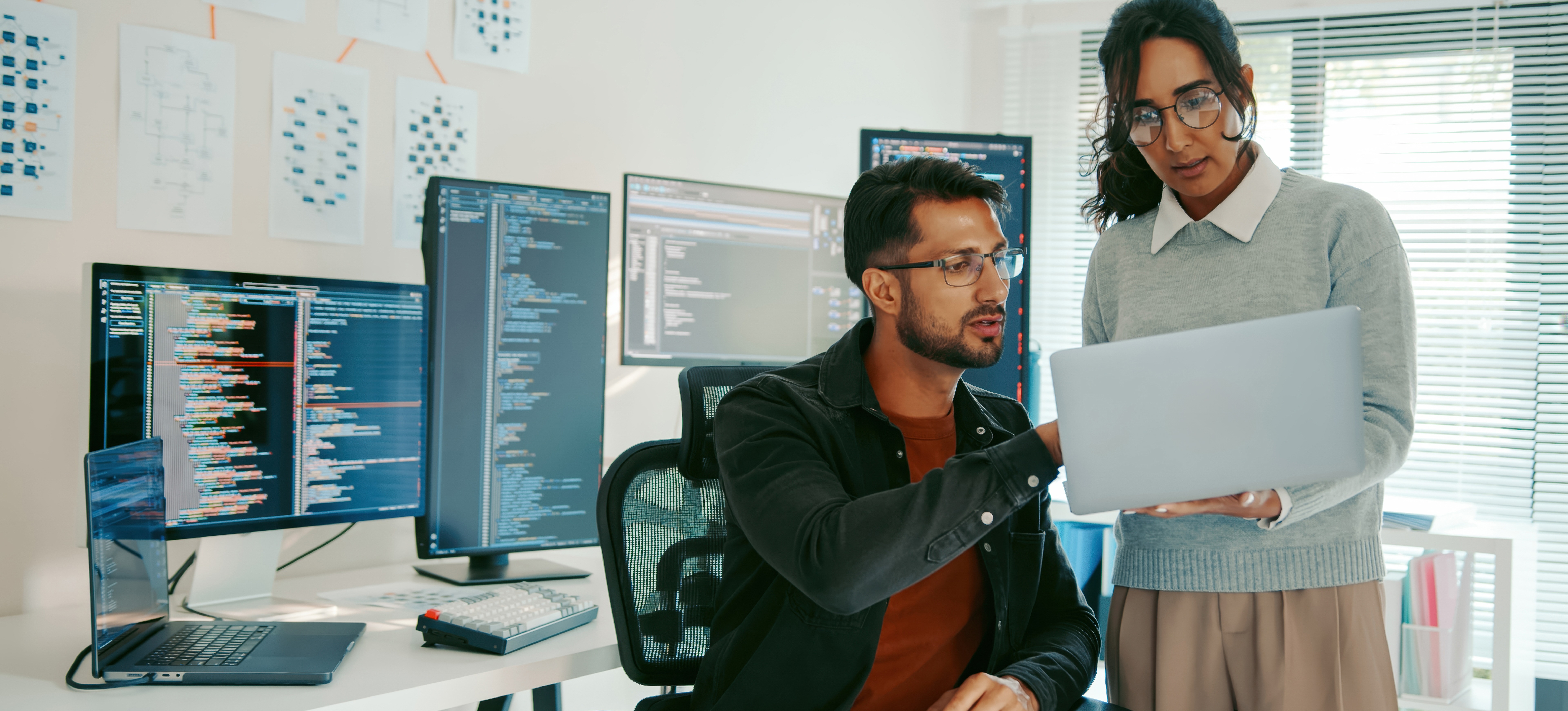 [Featured Image] Programmers in a tech-driven environment discussing LLM parameters.