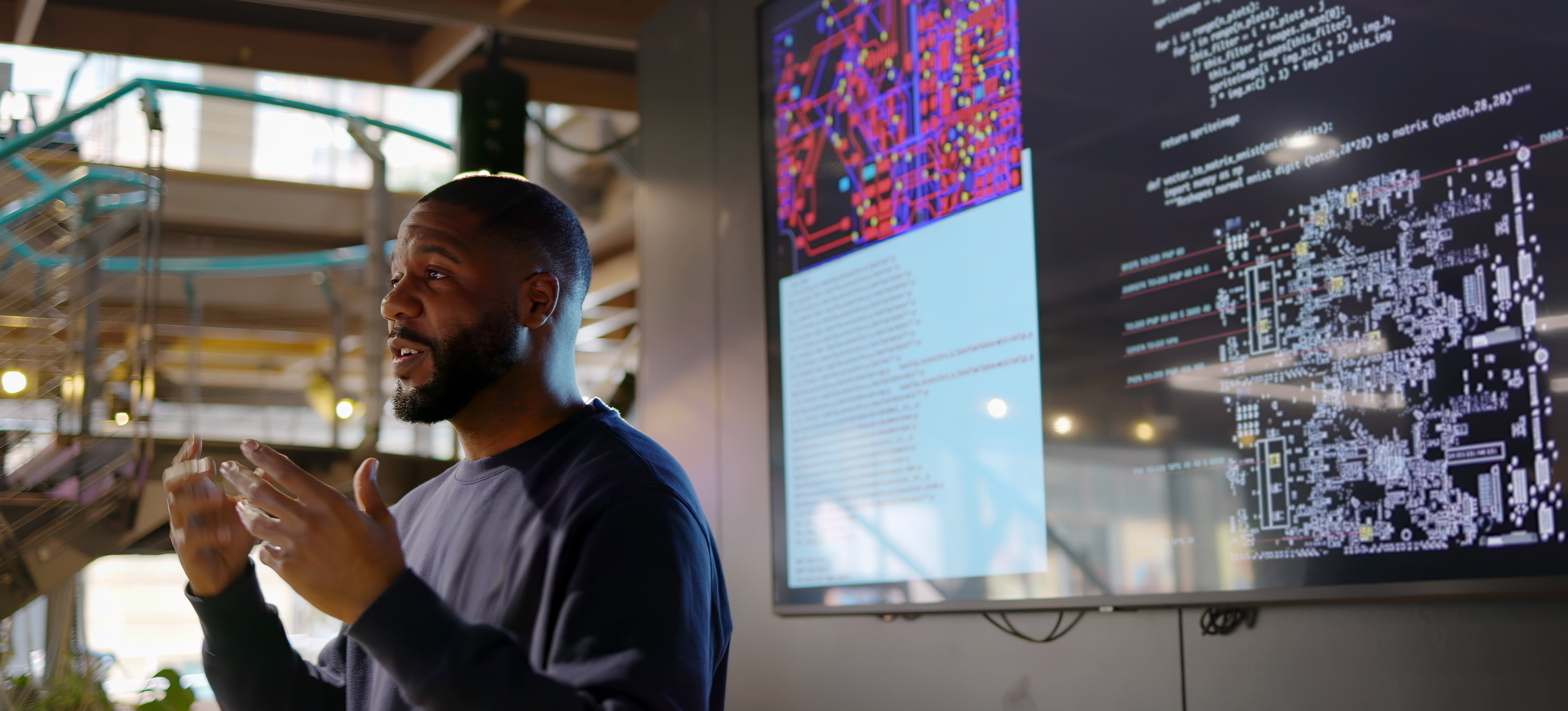 [Featured Image] A computer programmer is presenting information on Julia versus R.
