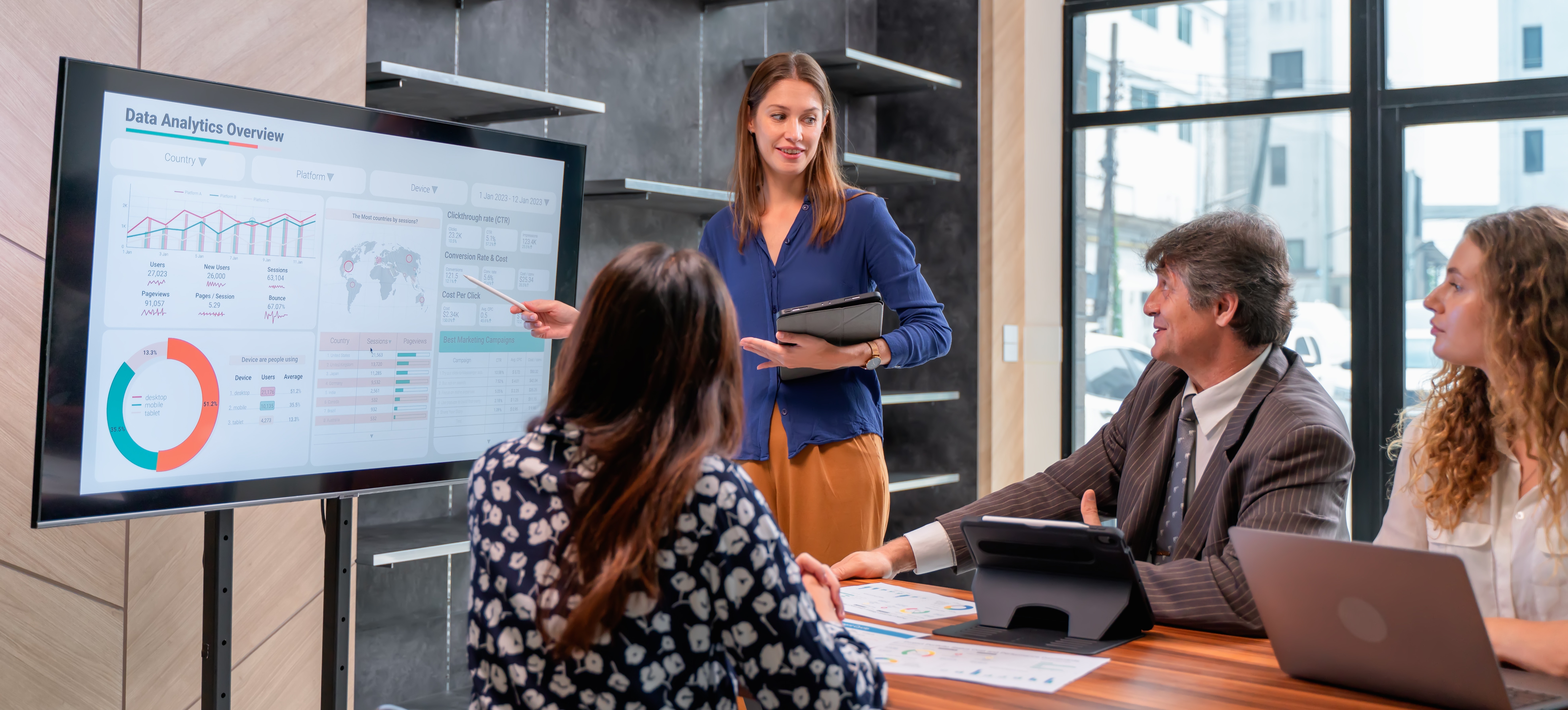 [Featured Image] A business team meets to discuss projected trends in their field through trend analysis data.