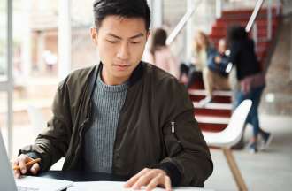 [Featured Image] A student studies for his master's degree despite his low GPA.