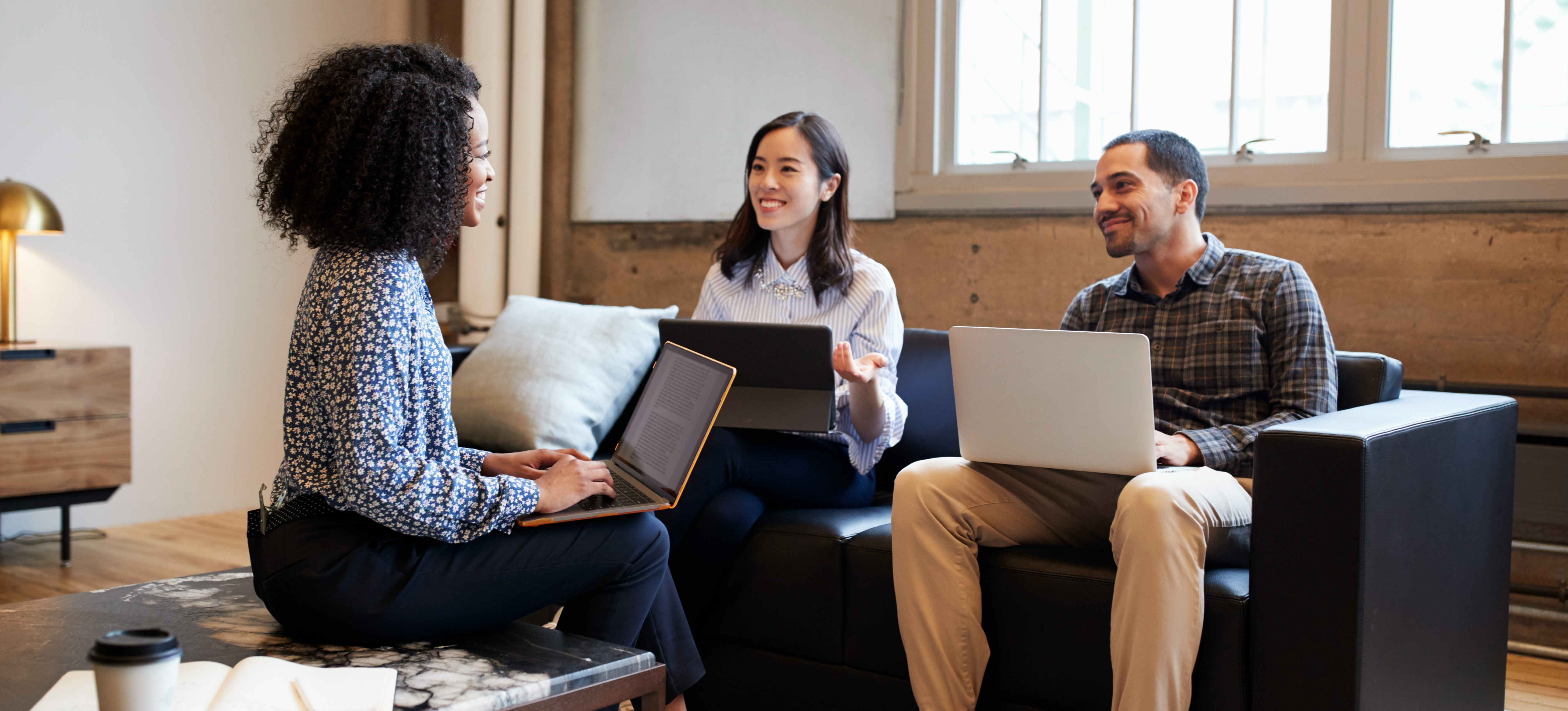 [Featured image] A marketing team is meeting regarding the different types of media their company needs for their next campaign.