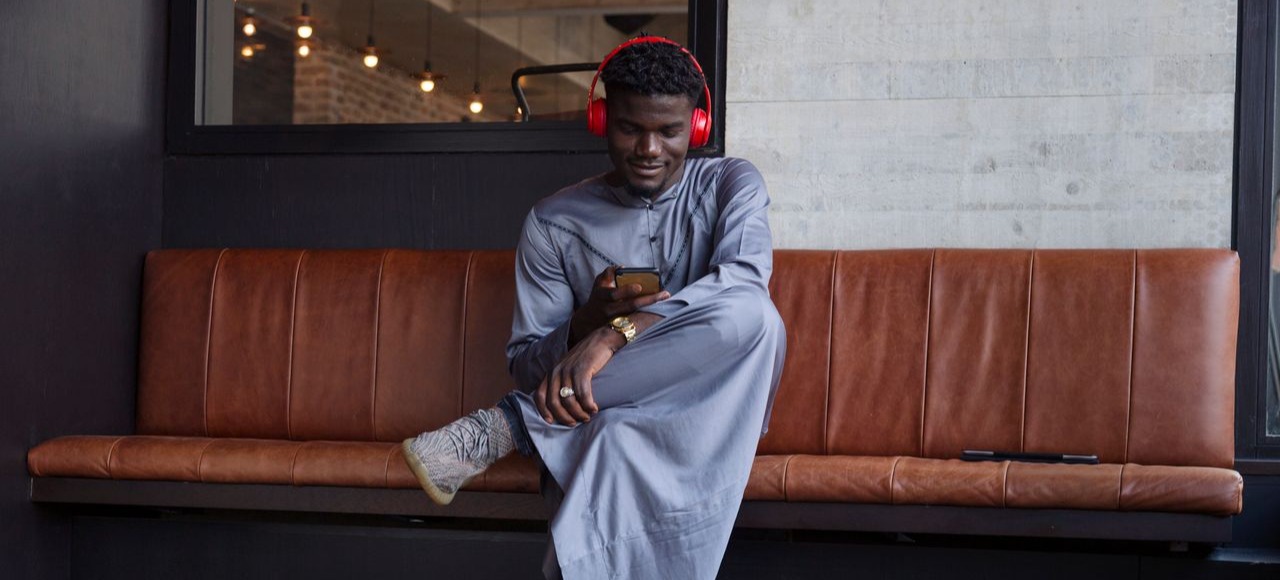 [Featured image] An IT support specialist looks up TCP/IP on their phone.