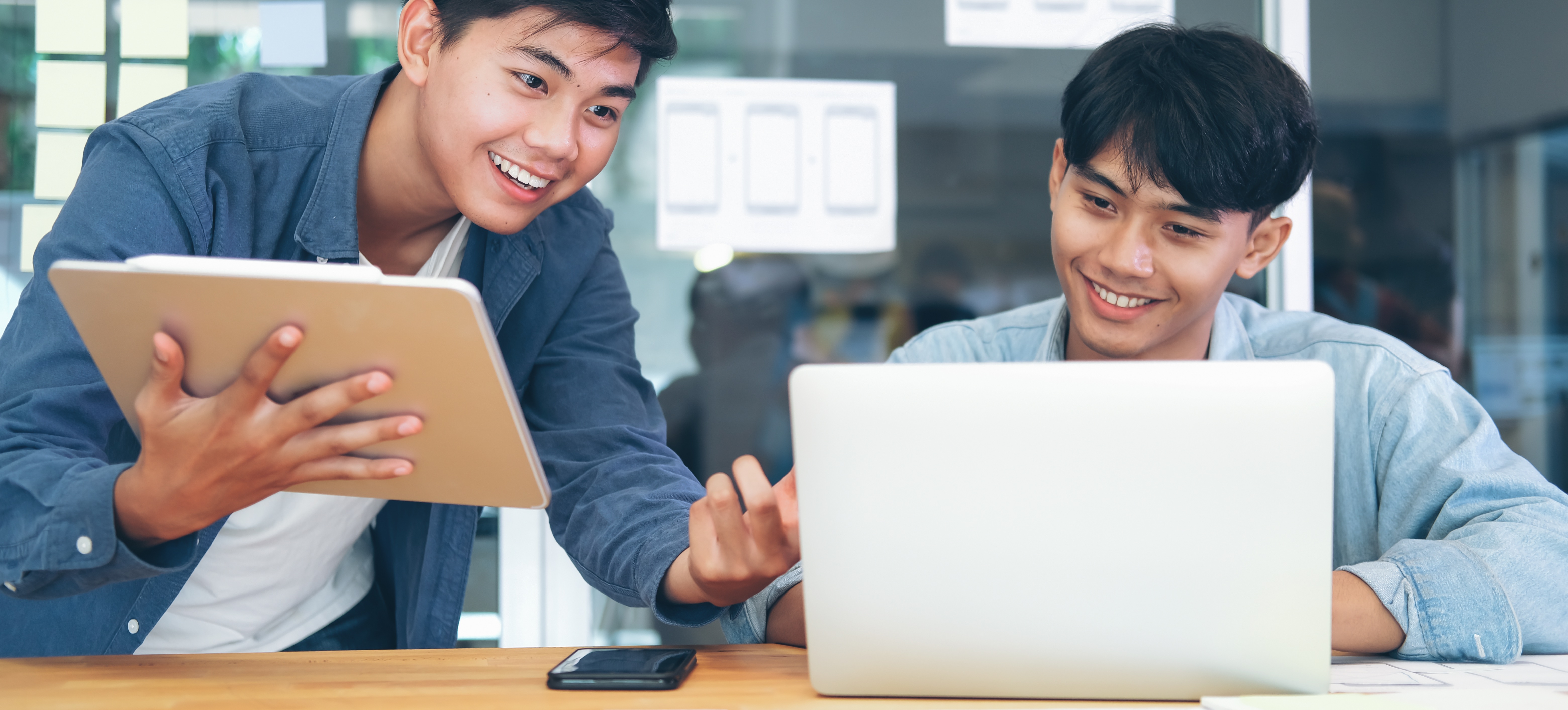 [Featured Image]: Two back-end developers discuss the best way to learn a new back-end framework for building web applications.
