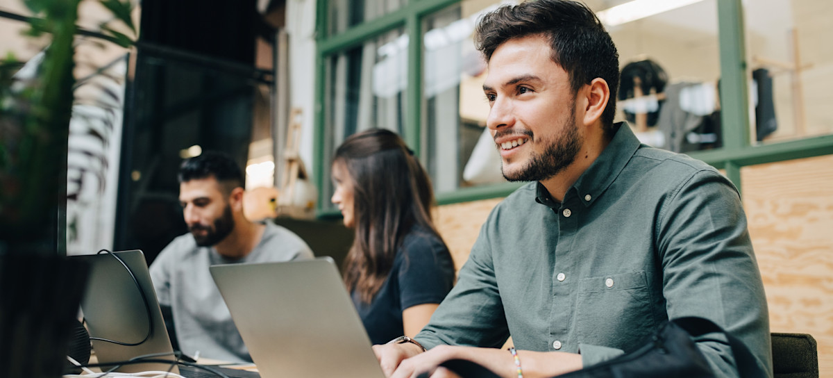 [Featured Image] A businessperson is on their laptop looking over their AI-generated customized training program.
