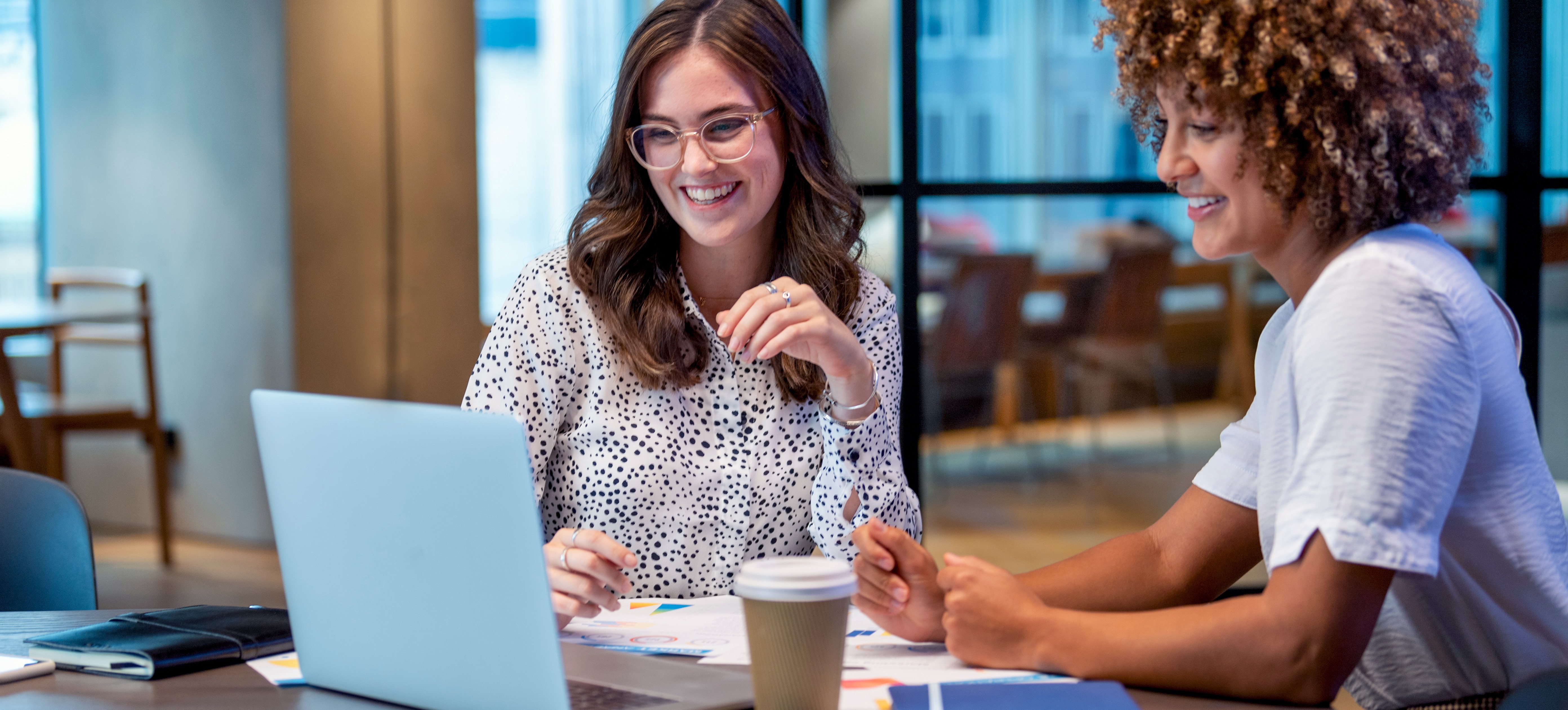[Featured Image] An HR business partner conducts an interview with a potential new candidate. 

