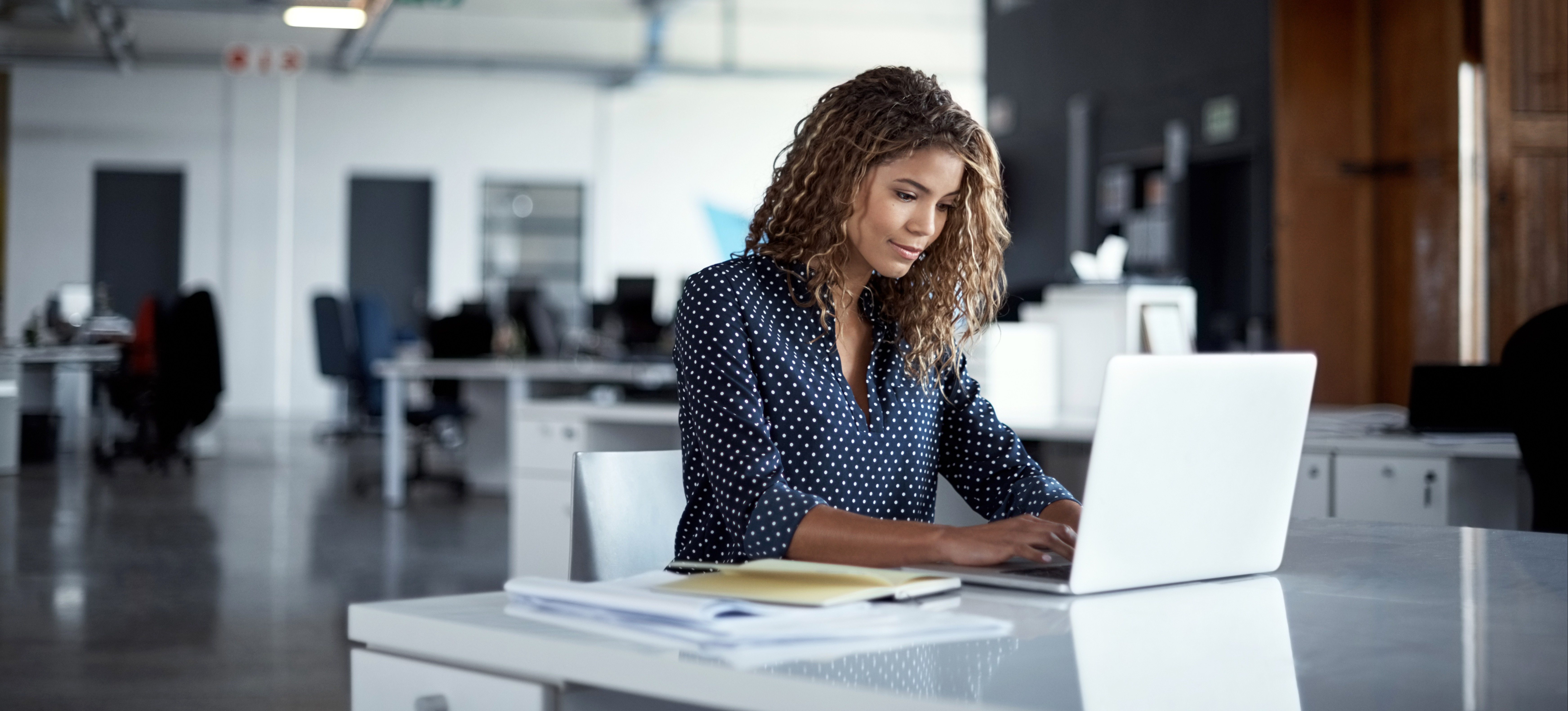 [Feature Image] An aspiring DevOps developer researches microservices vs. monolithic architecture as they plan the development model for an upcoming project.
