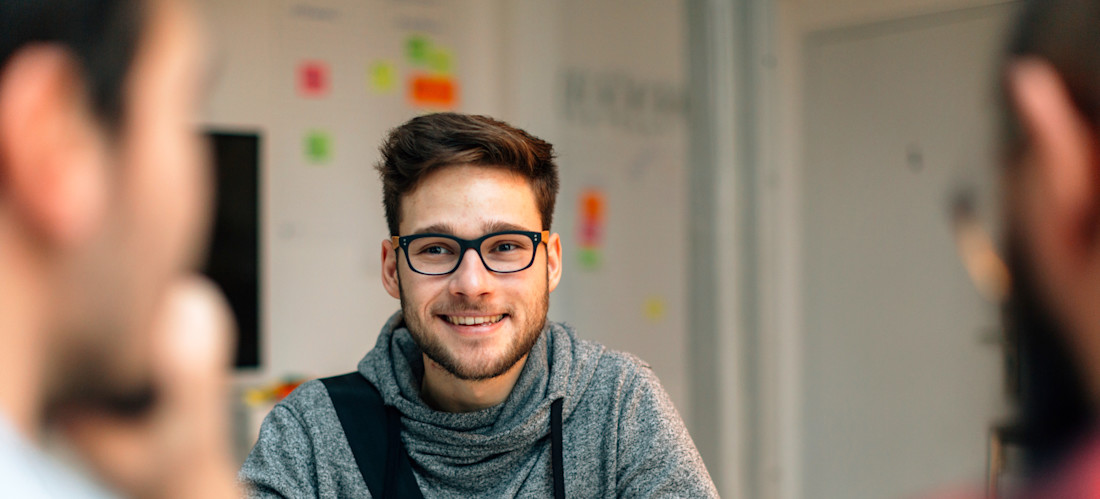 [Featured image] A candidate is interviewing for an entry-level finance job.