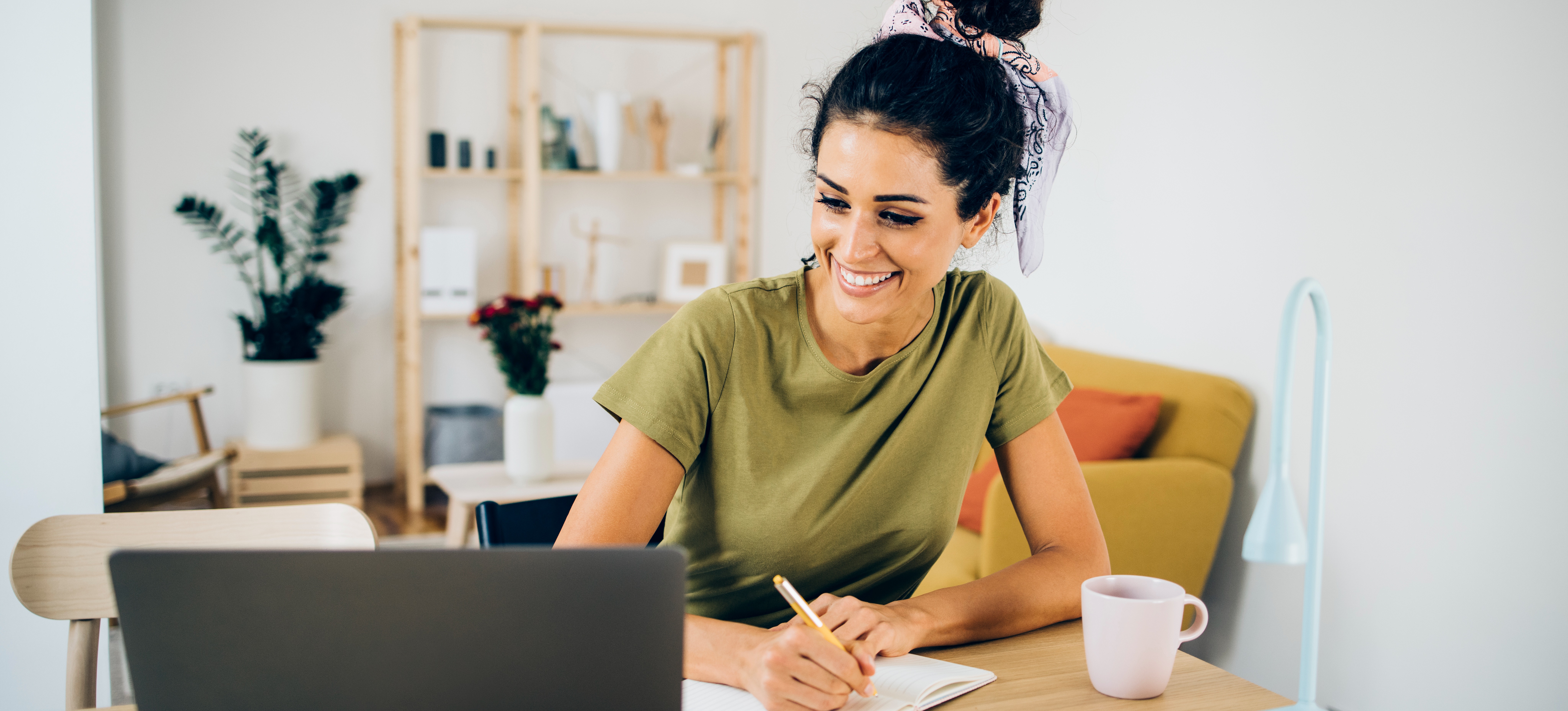 [Featured Image] A software engineer works from home with their laptop and considers the best types of data structures for organizing their data.
