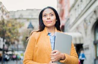 Woman outside administration building