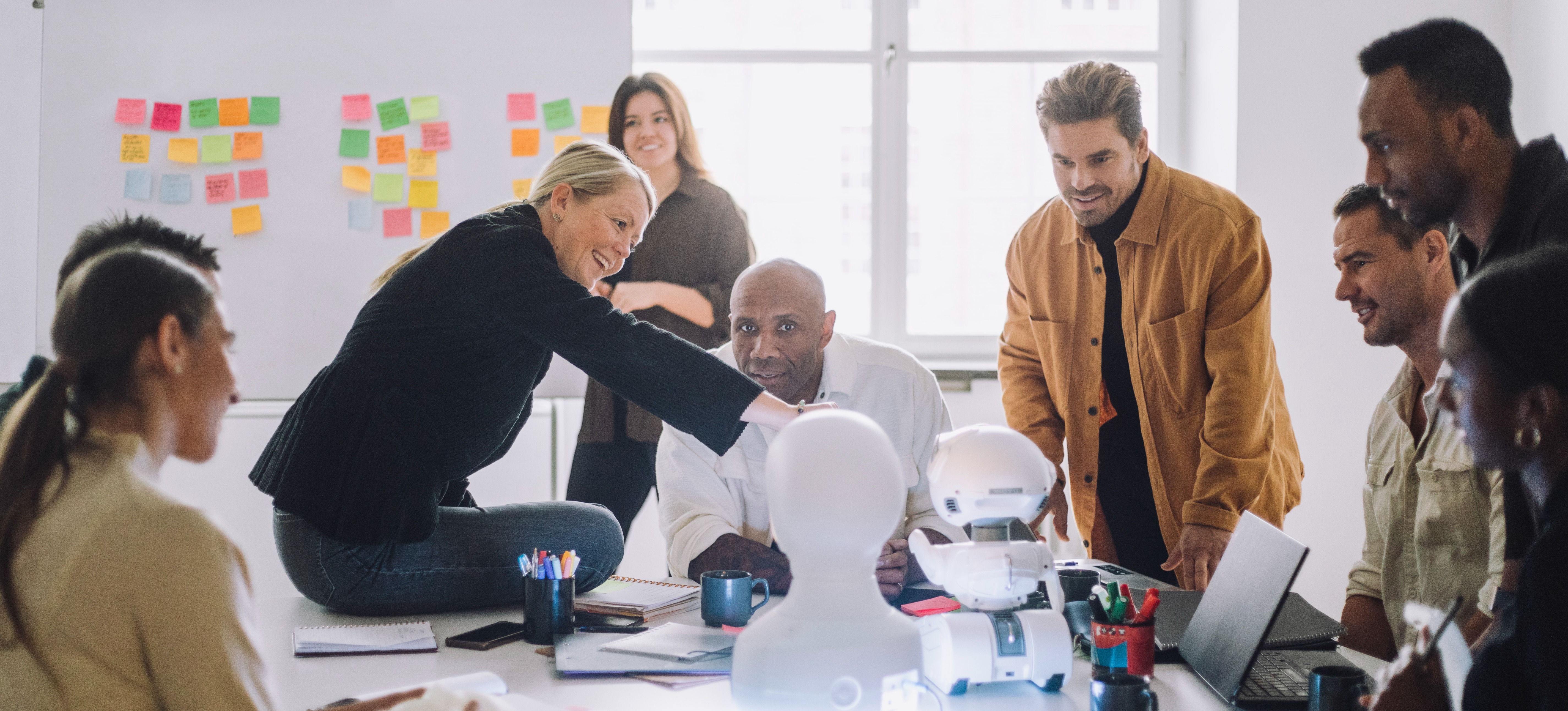 [Featured Image] A team of developers are working on creating a robot while paying strict attention to the programming as to not allow for AI bias in machine learning.
