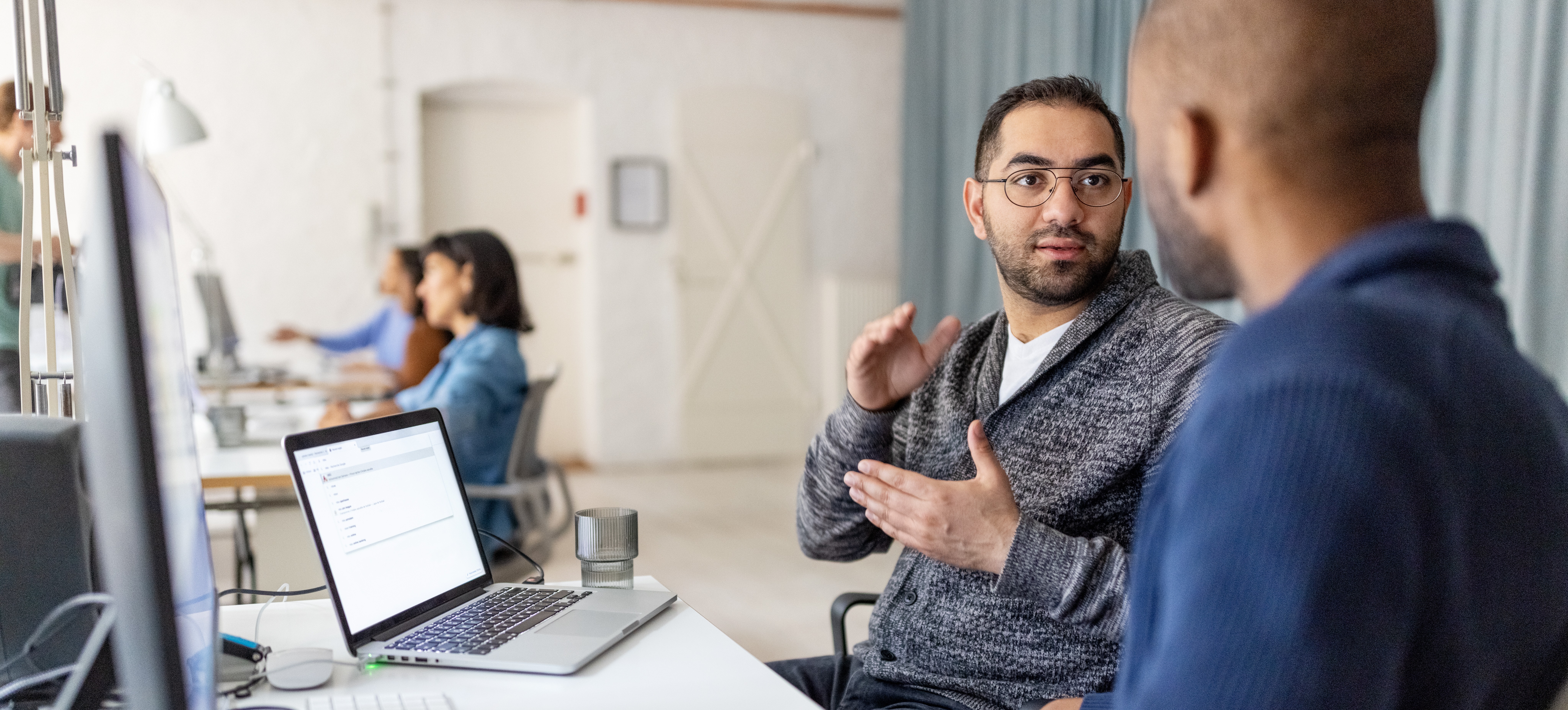 [Featured Image] Software developers answer the question, “What is lemmatization?” and discuss how it fits into natural language processing. 
