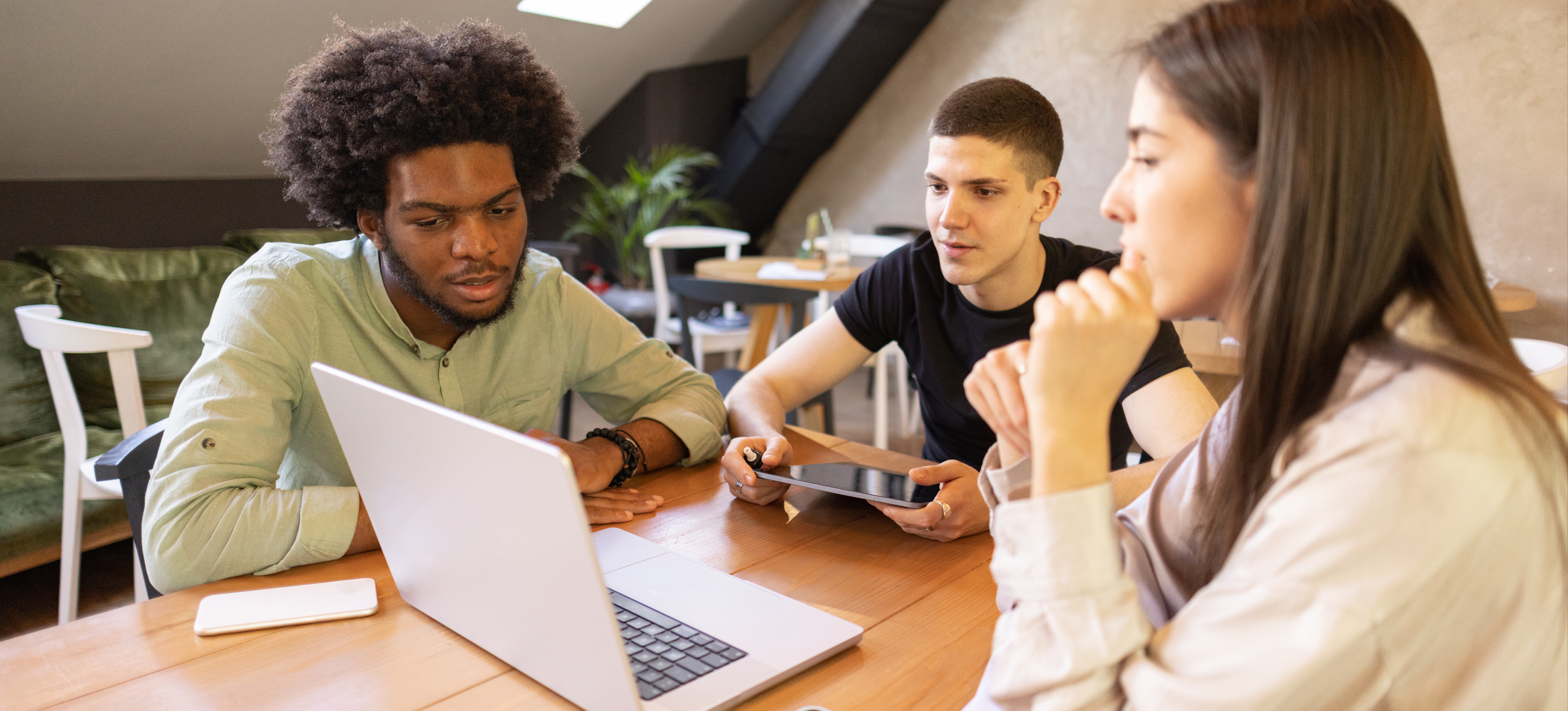 [Featured Image] A group a coworkers are learning how to use a google search console to track activity on their website.