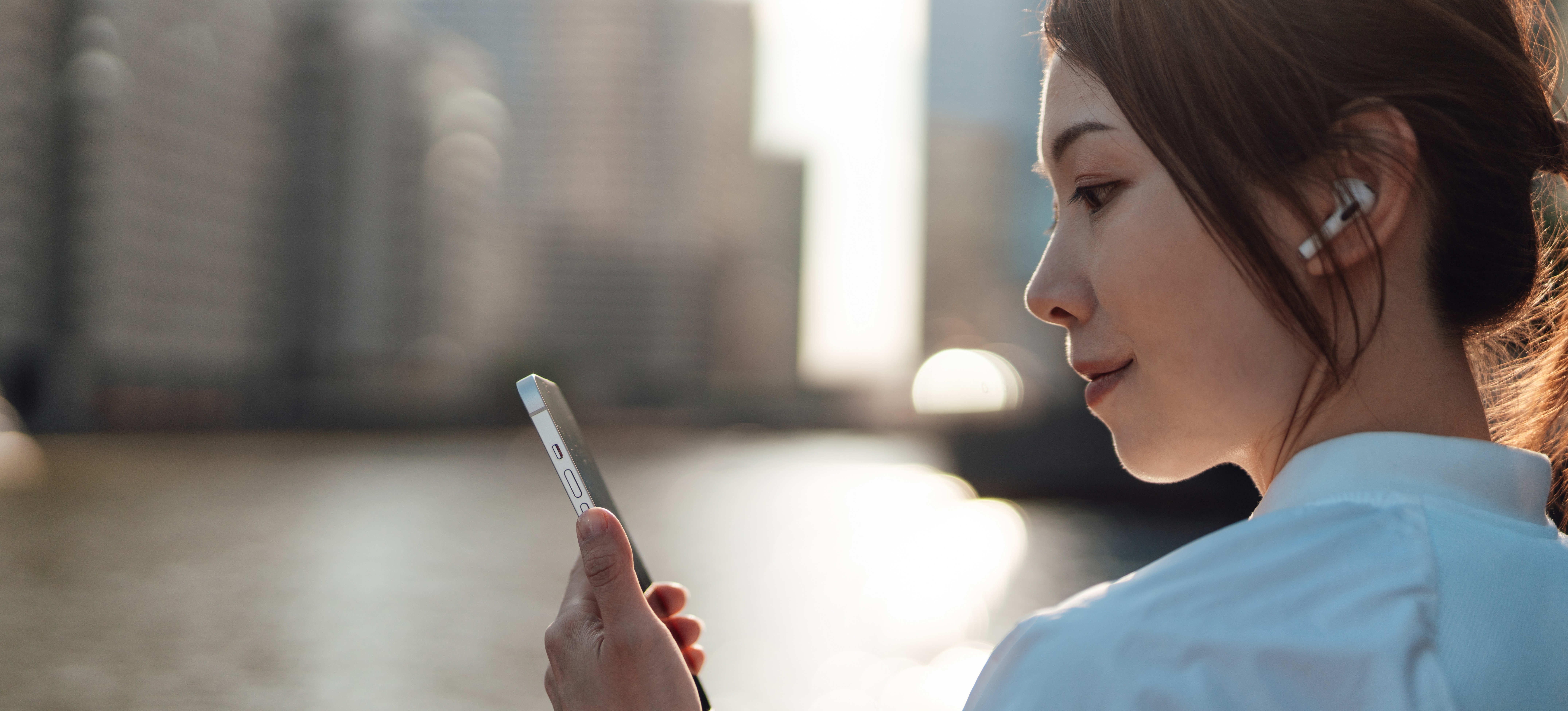 [Featured Image] A smartphone user reviews a sponsored social media post that’s part of the advertiser’s paid media campaign. 
